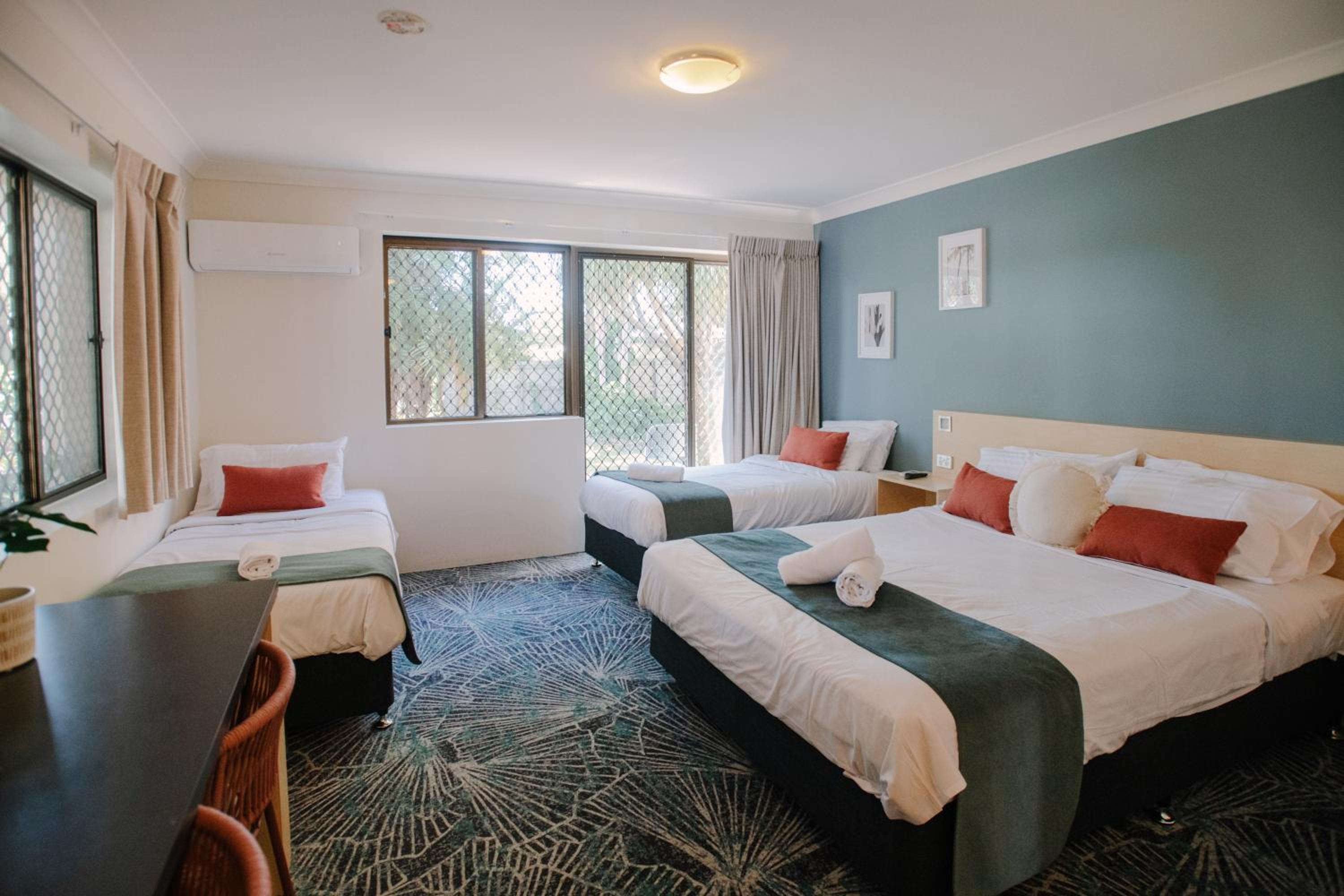 Family Room with Queen and Two Single Beds