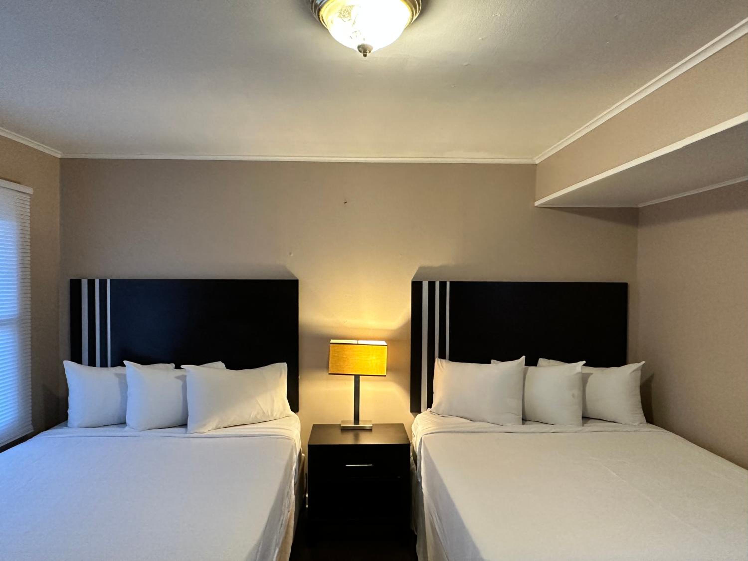 Queen Room with Two Queen Beds - Photo 1
