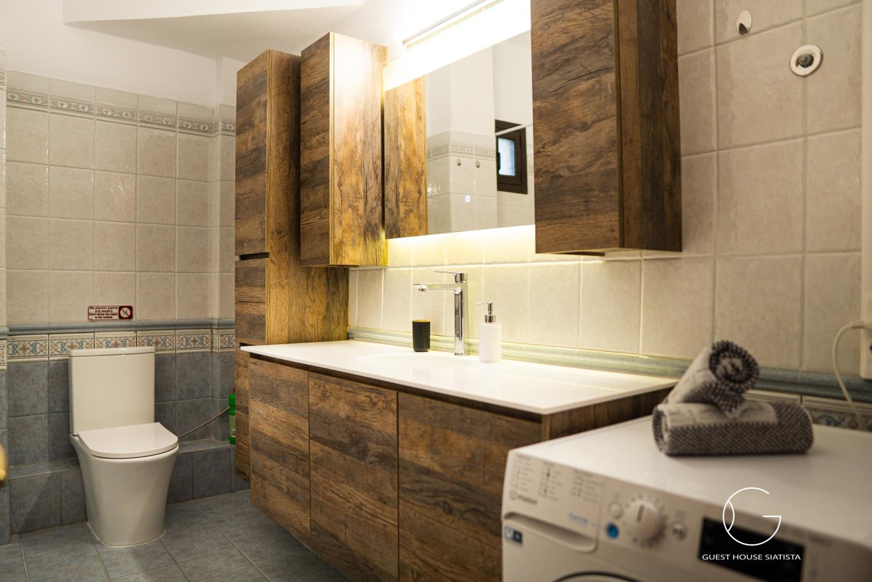 Three-Bedroom House - Photo 2