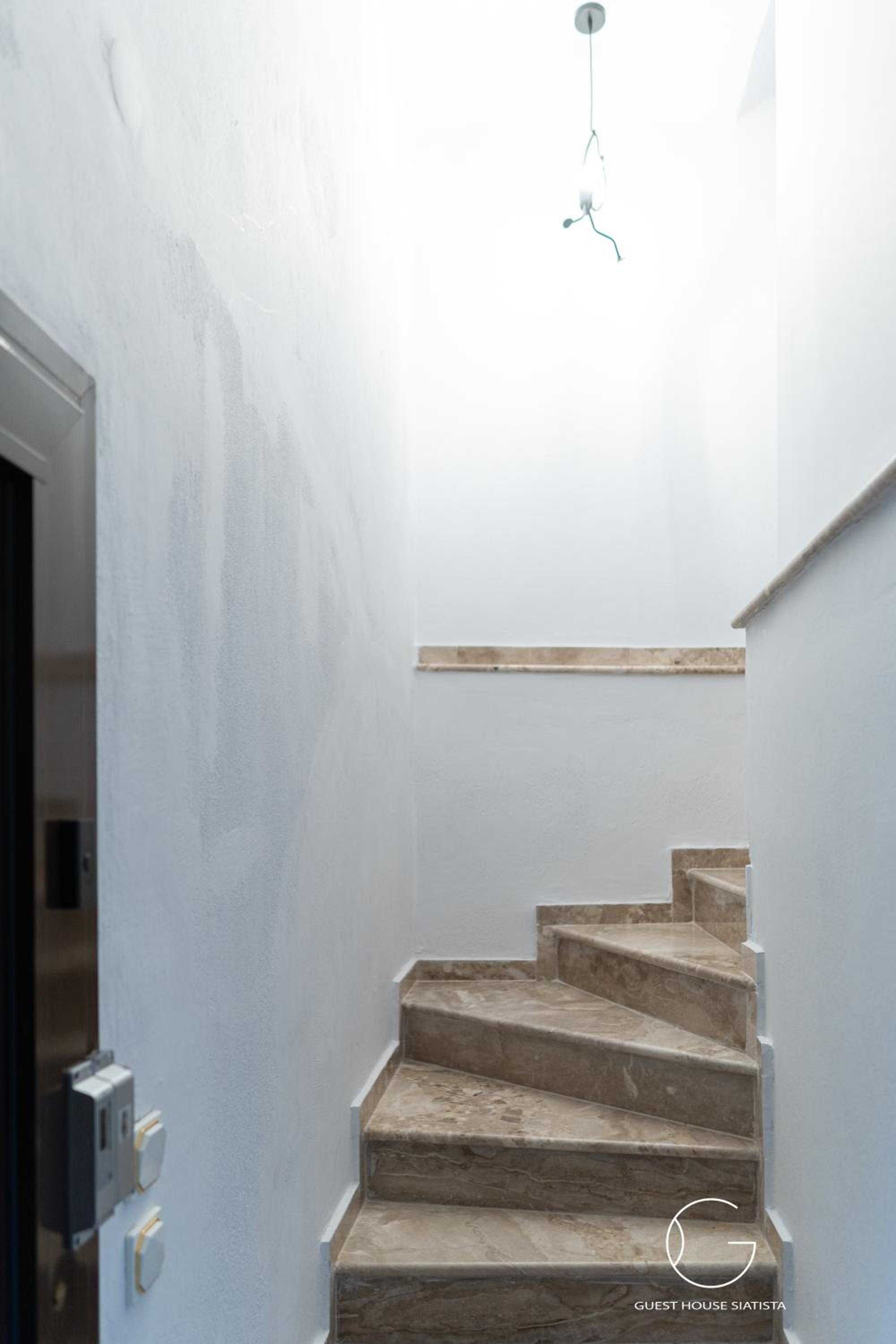 Three-Bedroom House - Photo 27