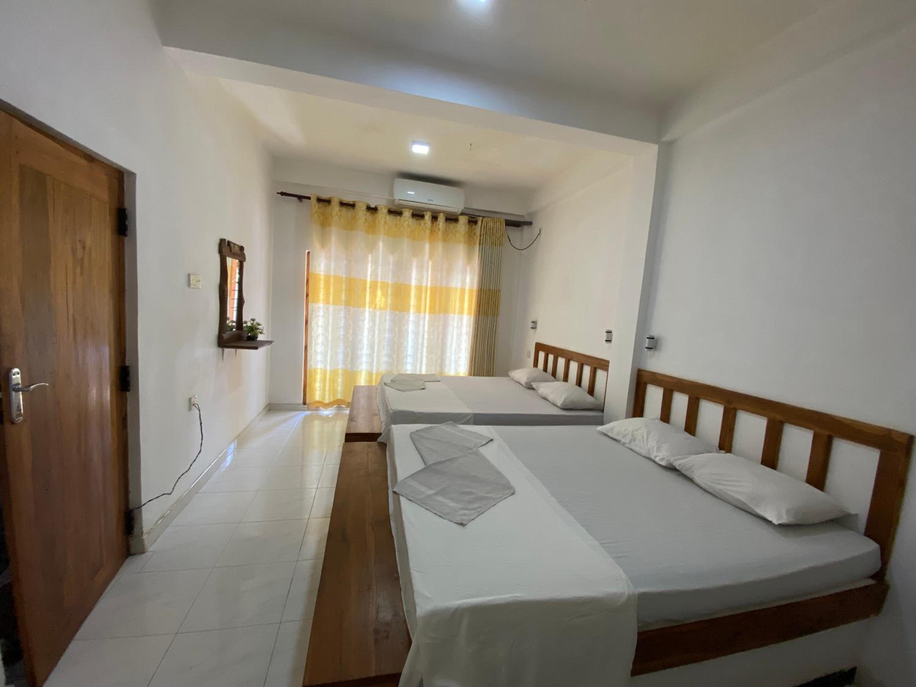 Quadruple Room with Private Bathroom photo 3