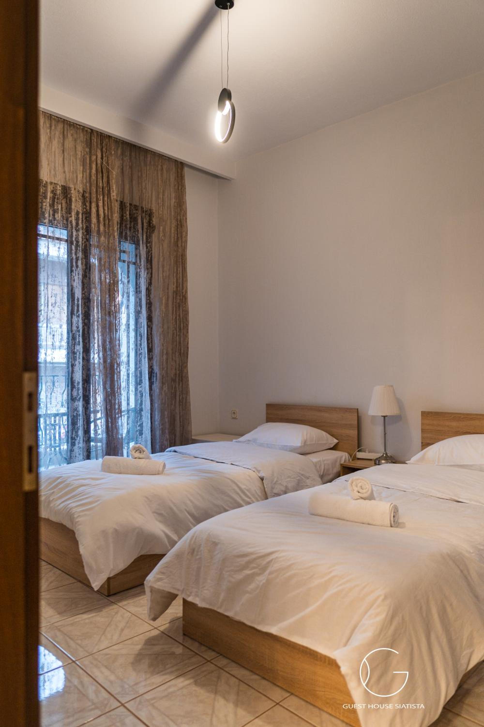 Three-Bedroom House - Photo 14