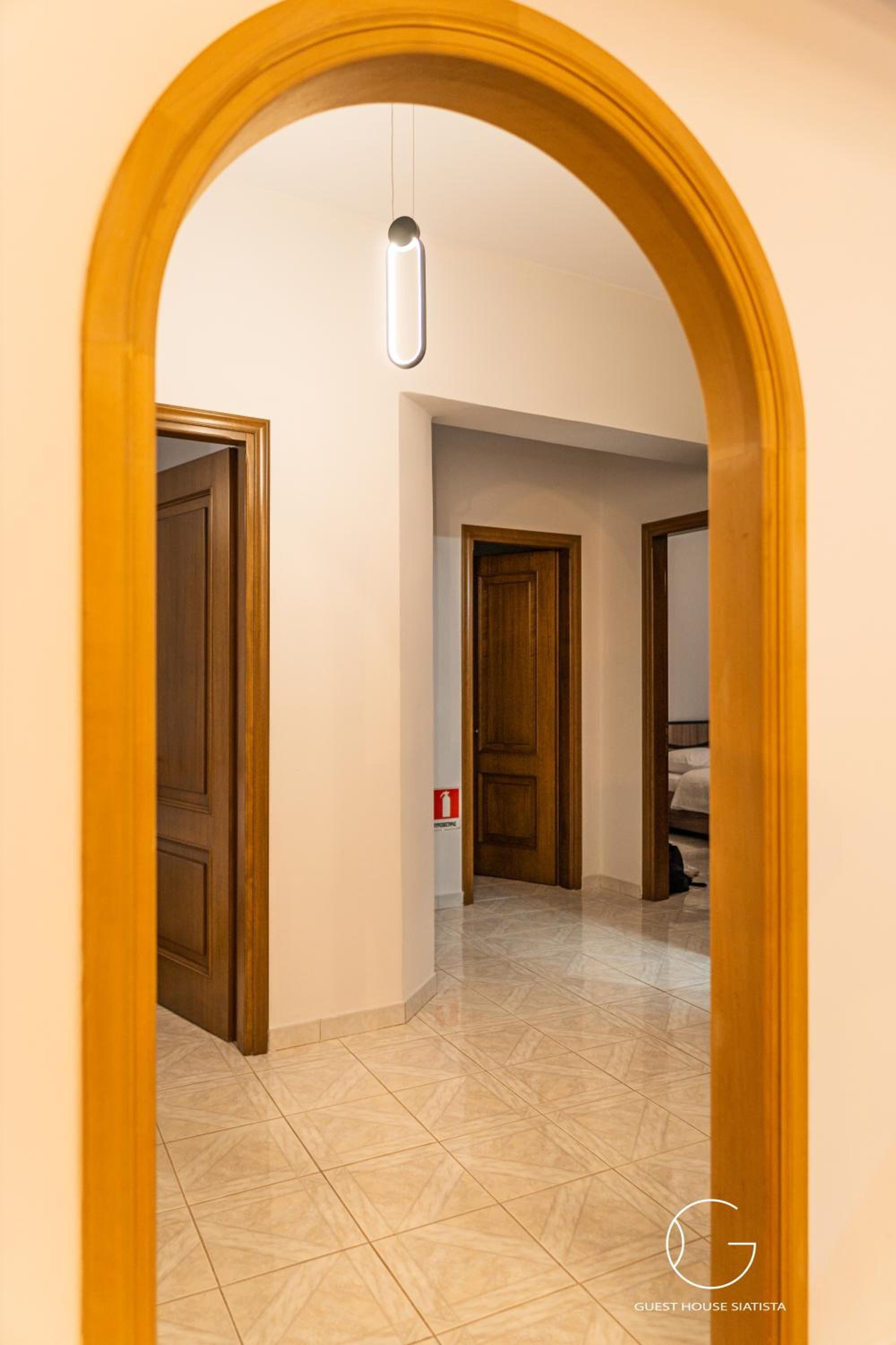 Three-Bedroom House - Photo 18