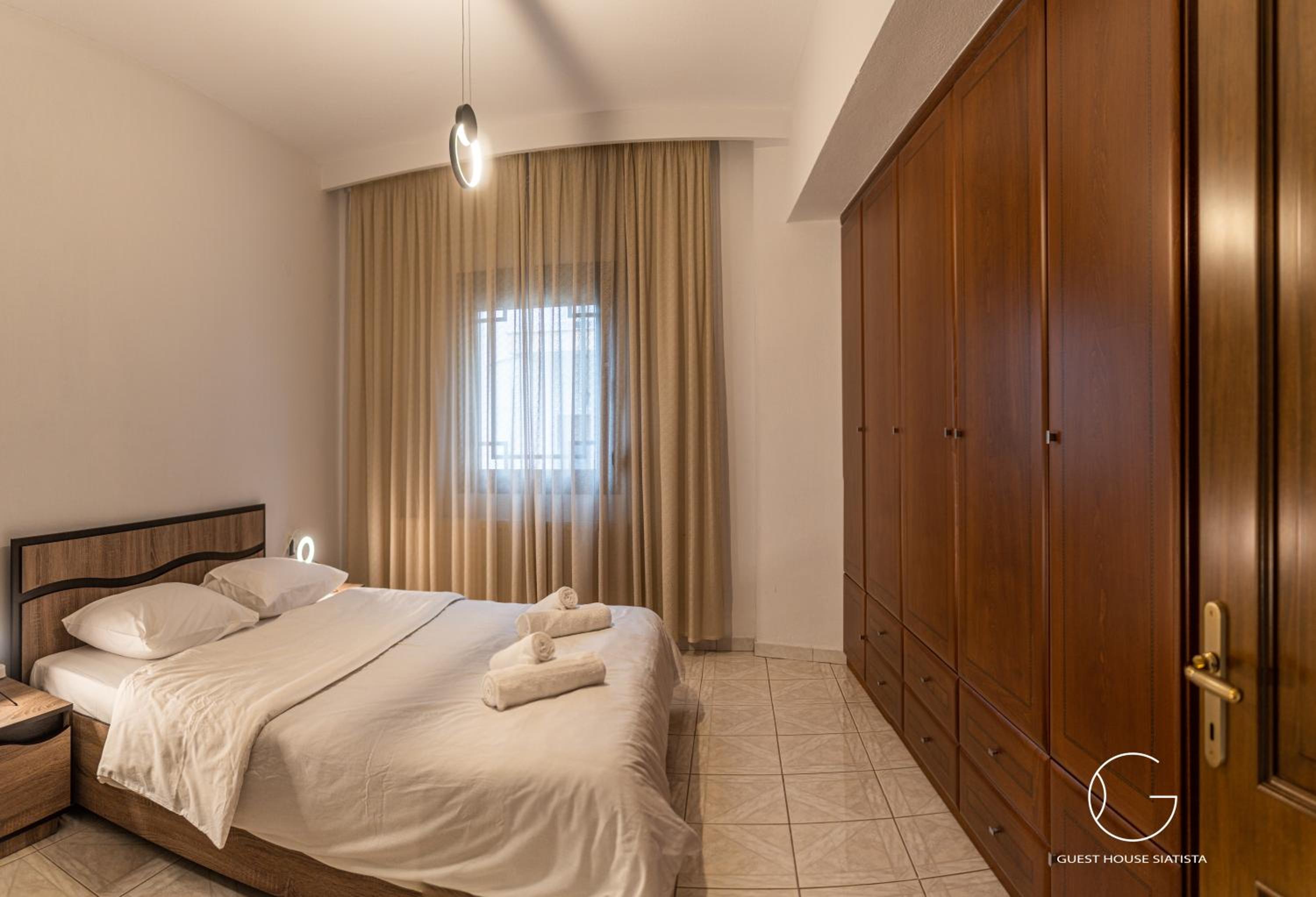 Three-Bedroom House - Photo 17