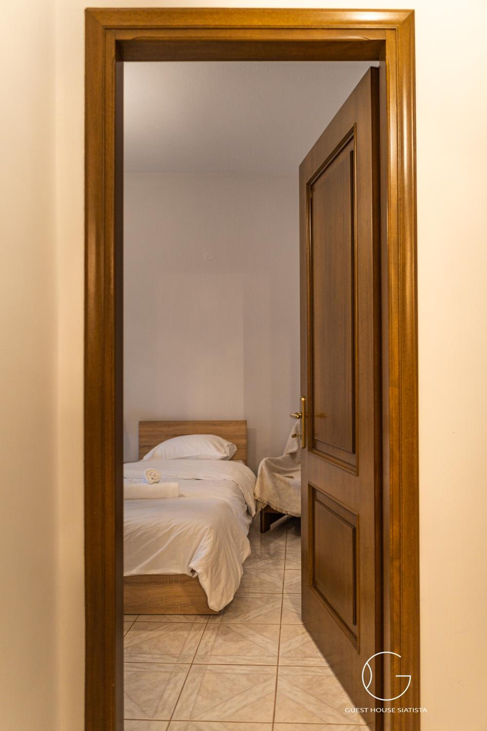 Three-Bedroom House - Photo 16