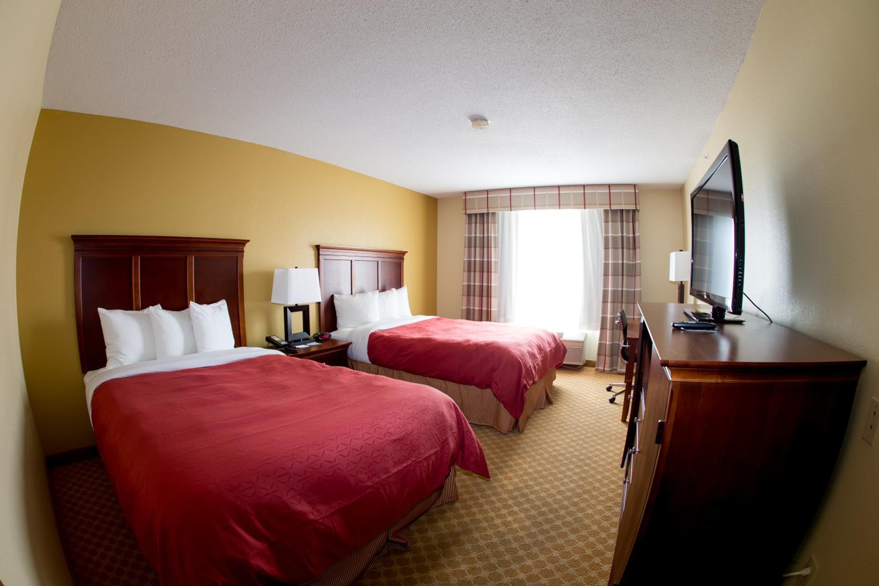 Queen Room with Two Queen Beds - Photo 1