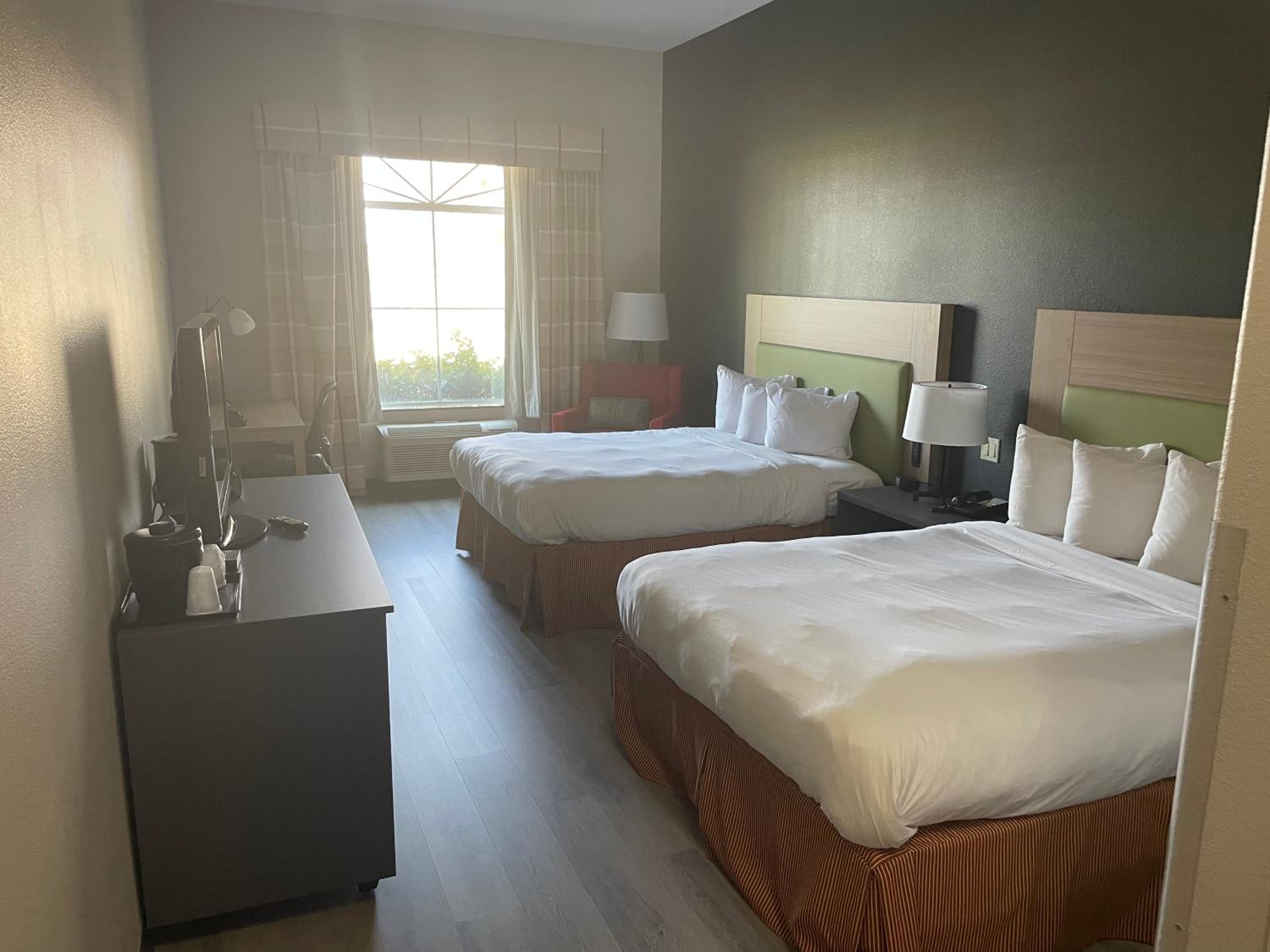 Queen Room with Two Queen Beds - Photo 1