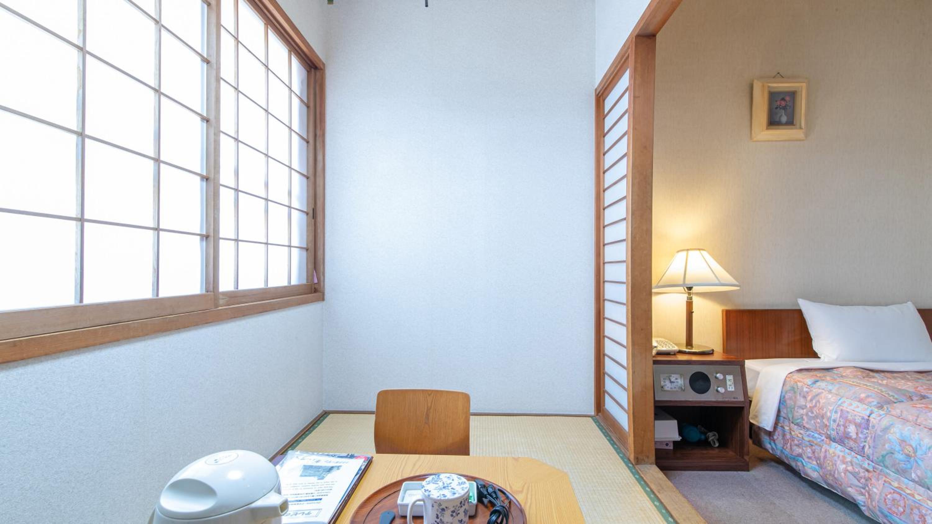 Small Twin Room - Photo 11