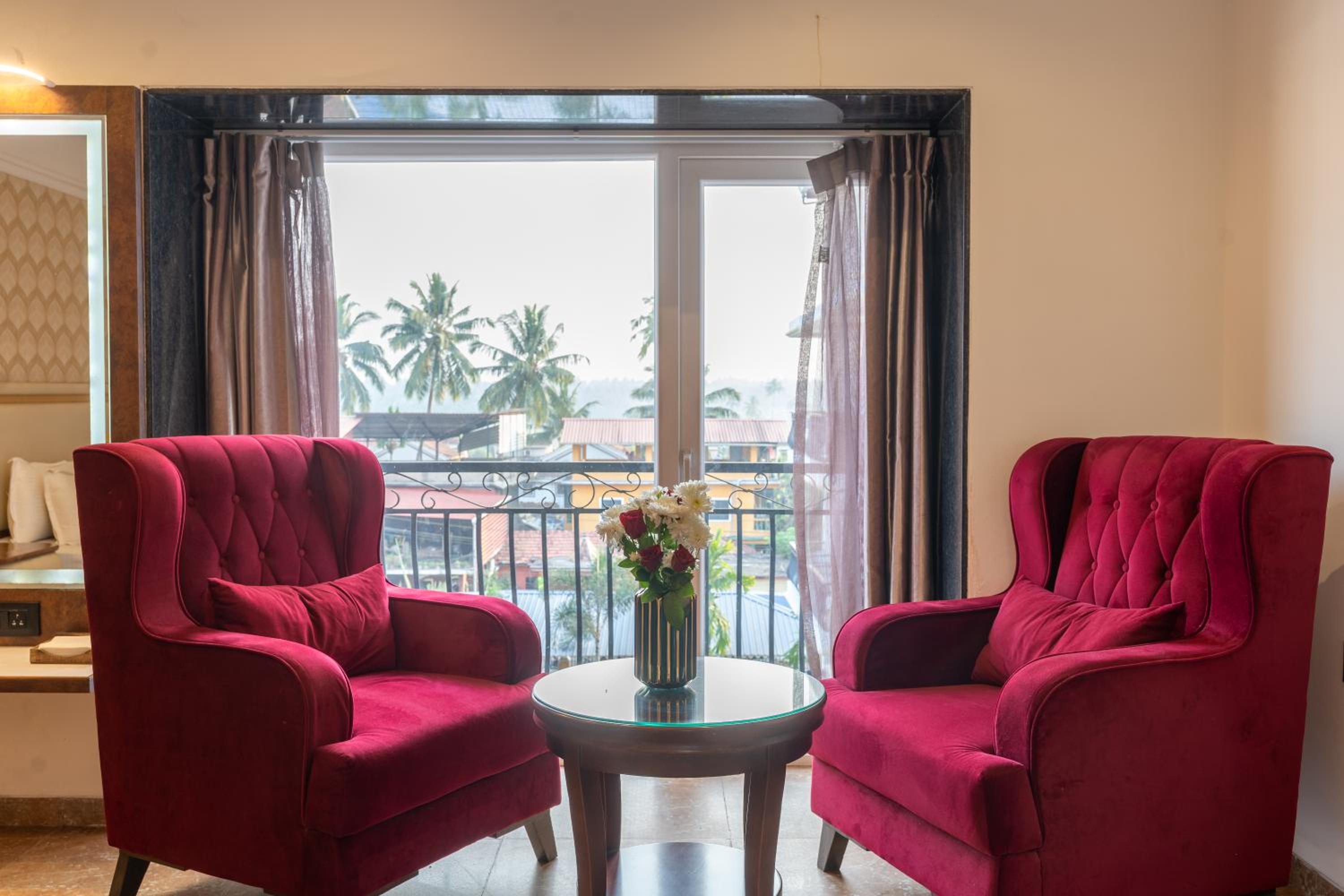 King Suite with Balcony - Photo 9