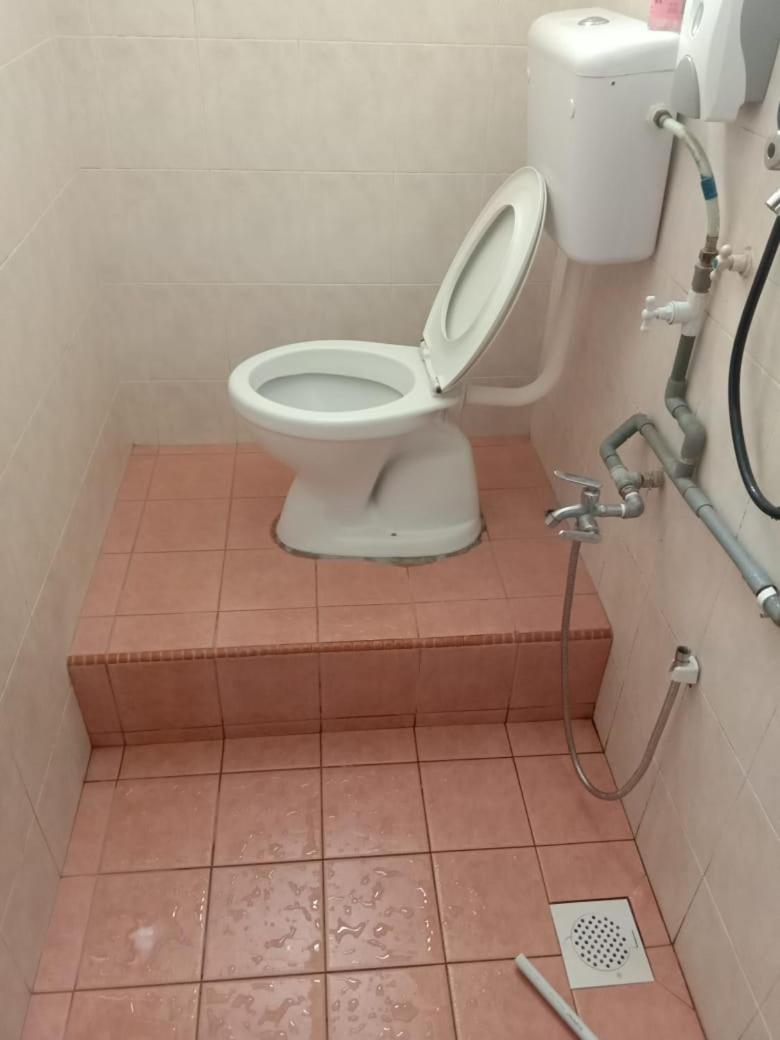 Basic Triple Room with Shared Bathroom photo 1