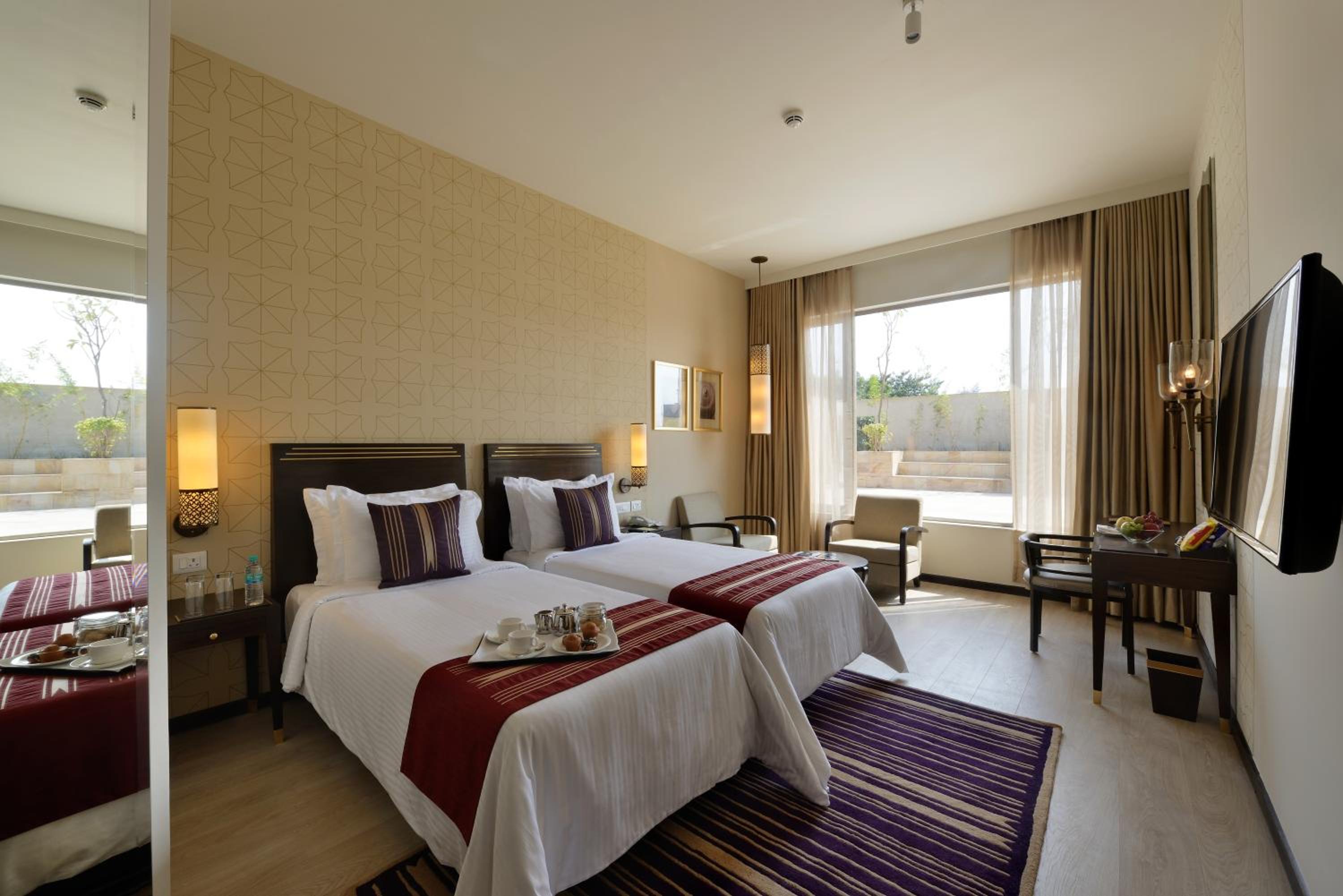 Premium Room  2 Single Beds - 20% Off on Laundry, Complimentary Welcome Drink on arrival, Signature Activities & Experiences , Complimentary In-Room Refreshments, featuring Fruit Basket, Cookie Platter   photo 1