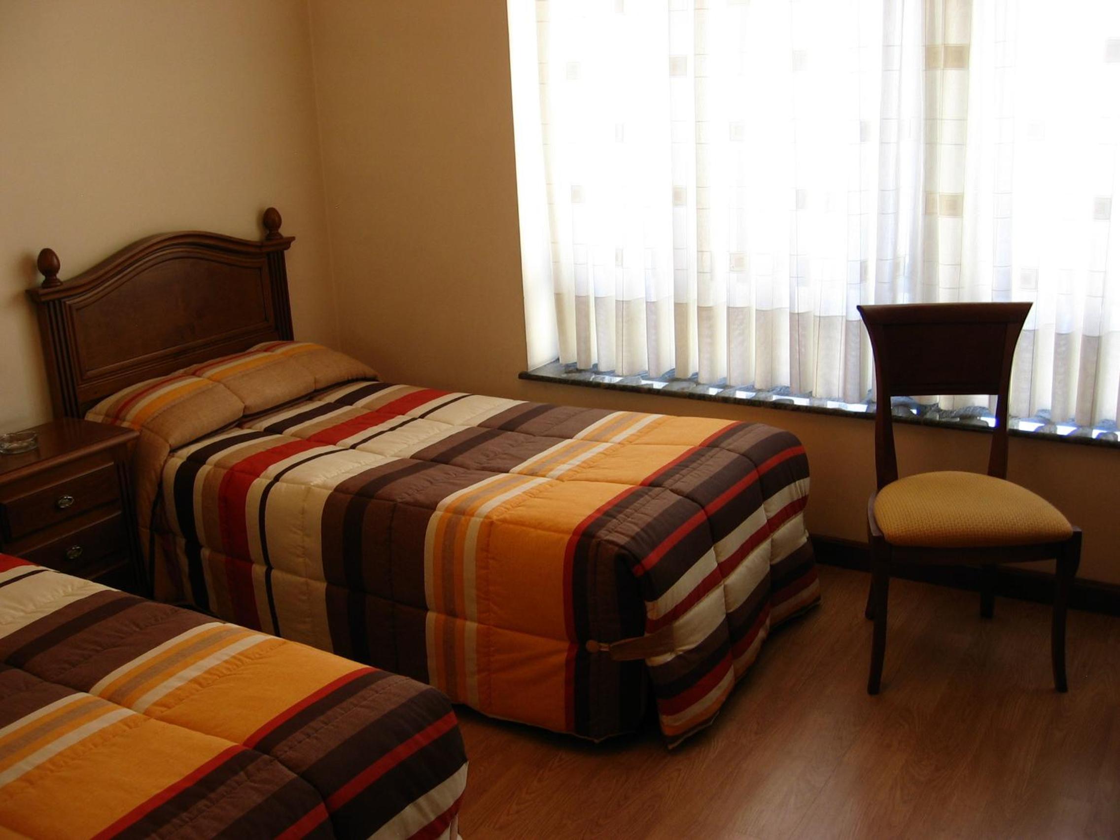 Twin Room - Photo 1