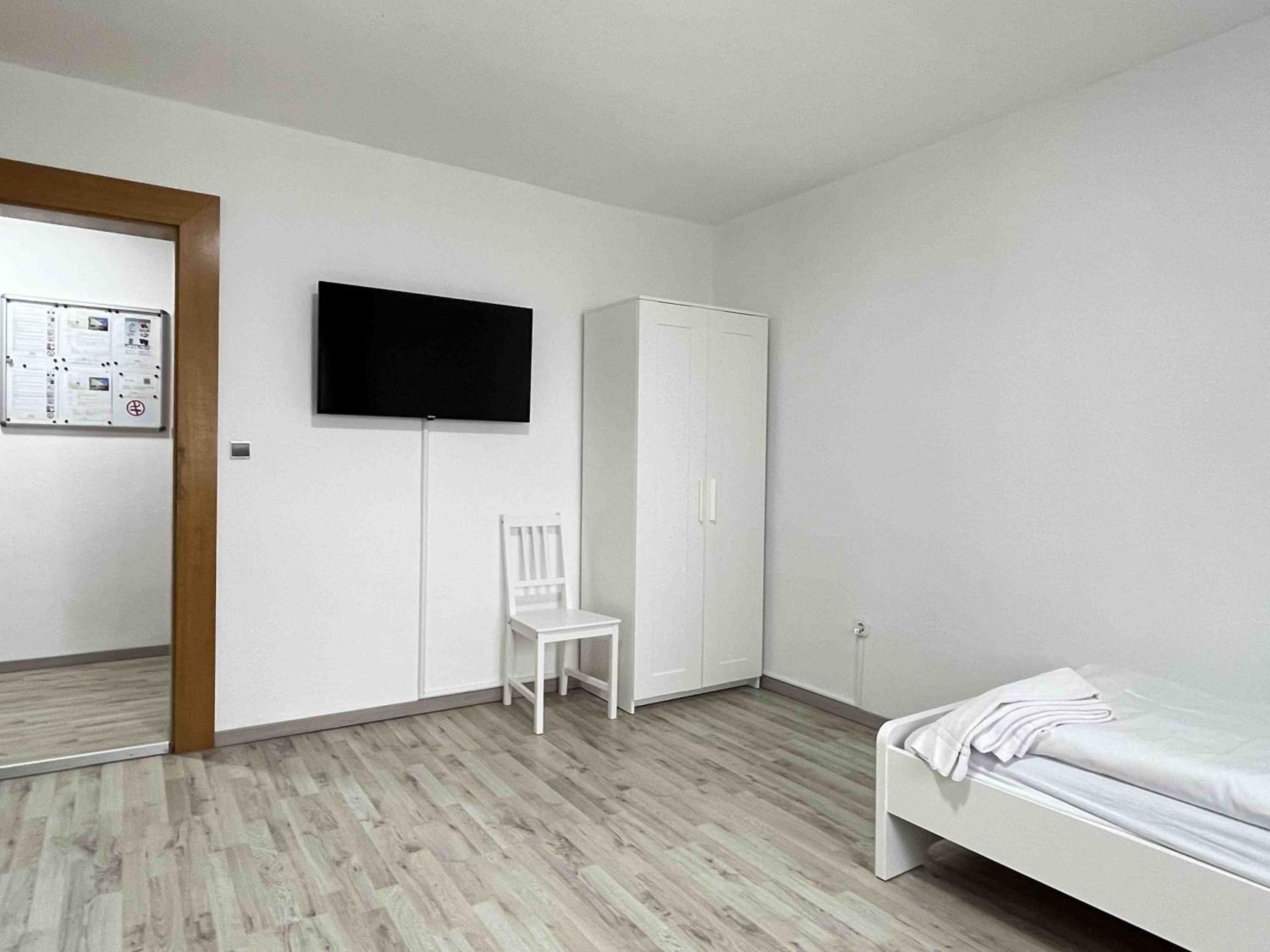 Three-Bedroom Apartment photo 1