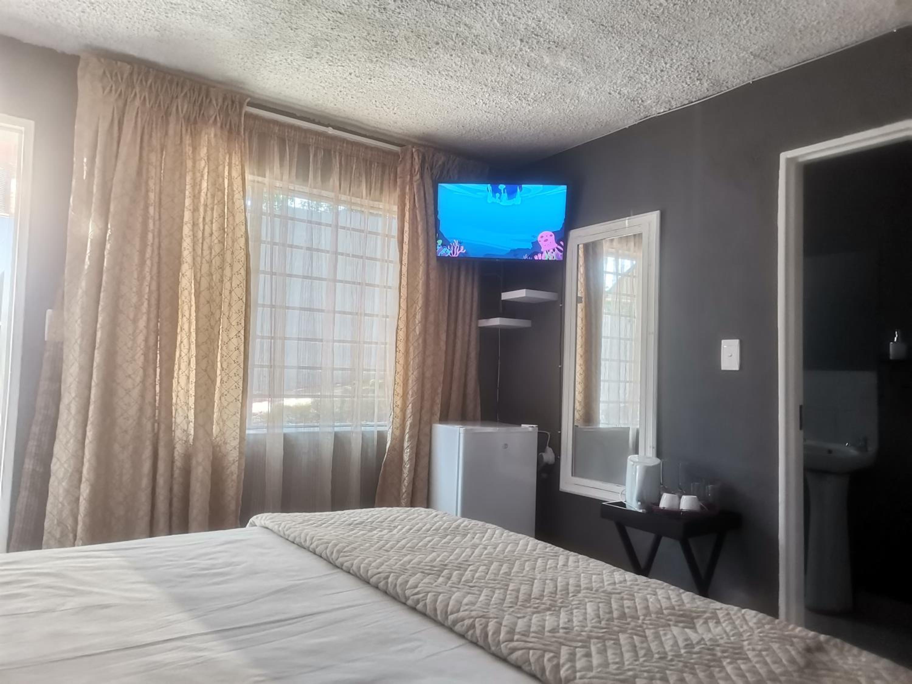 Four-Bedroom House - Photo 28