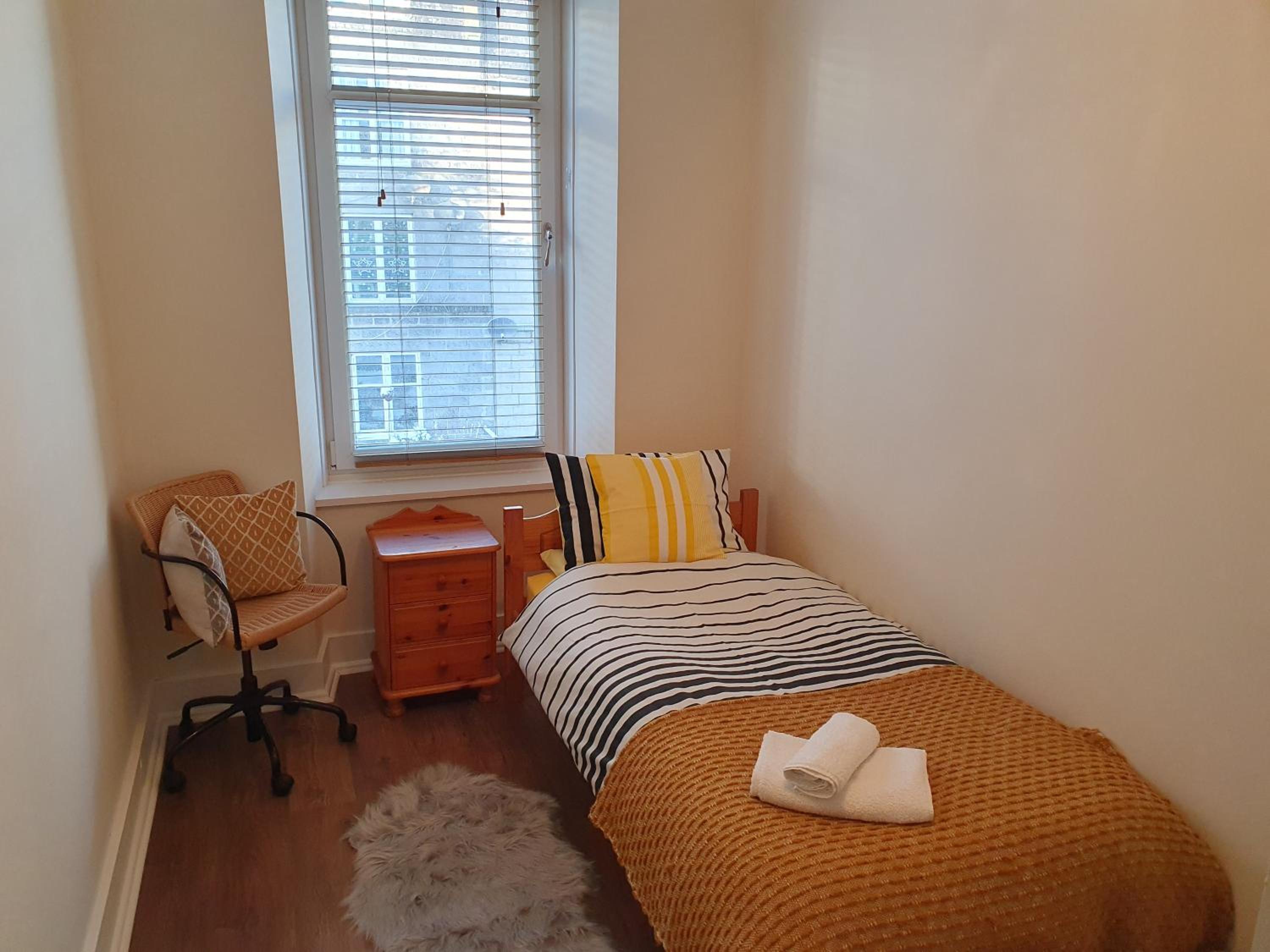 Three-Bedroom Apartment photo 1