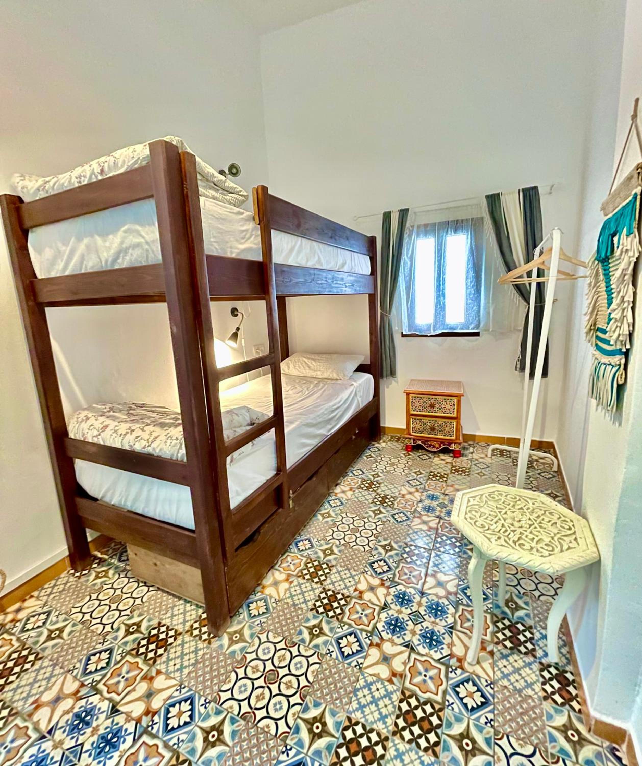 Bed in 4-Bed Dormitory Room photo 1