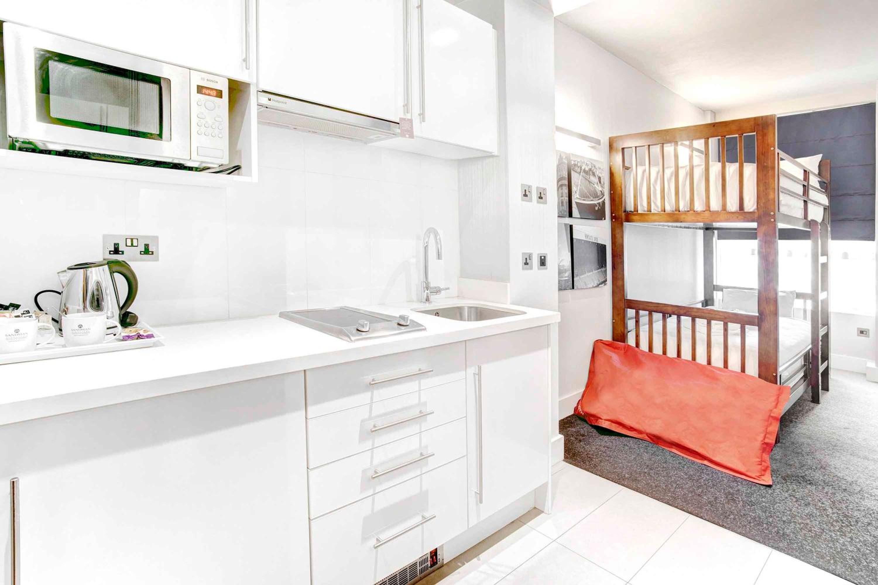 Family Suite, 1 King Bed, Bunk Beds, Kitchenette - Photo 2