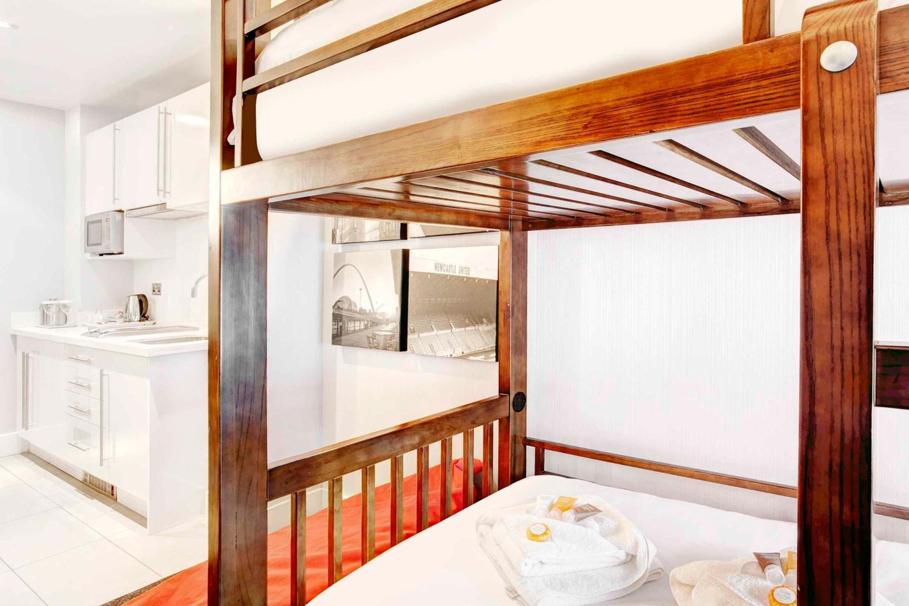 Family Suite, 1 King Bed, Bunk Beds, Kitchenette - Photo 9