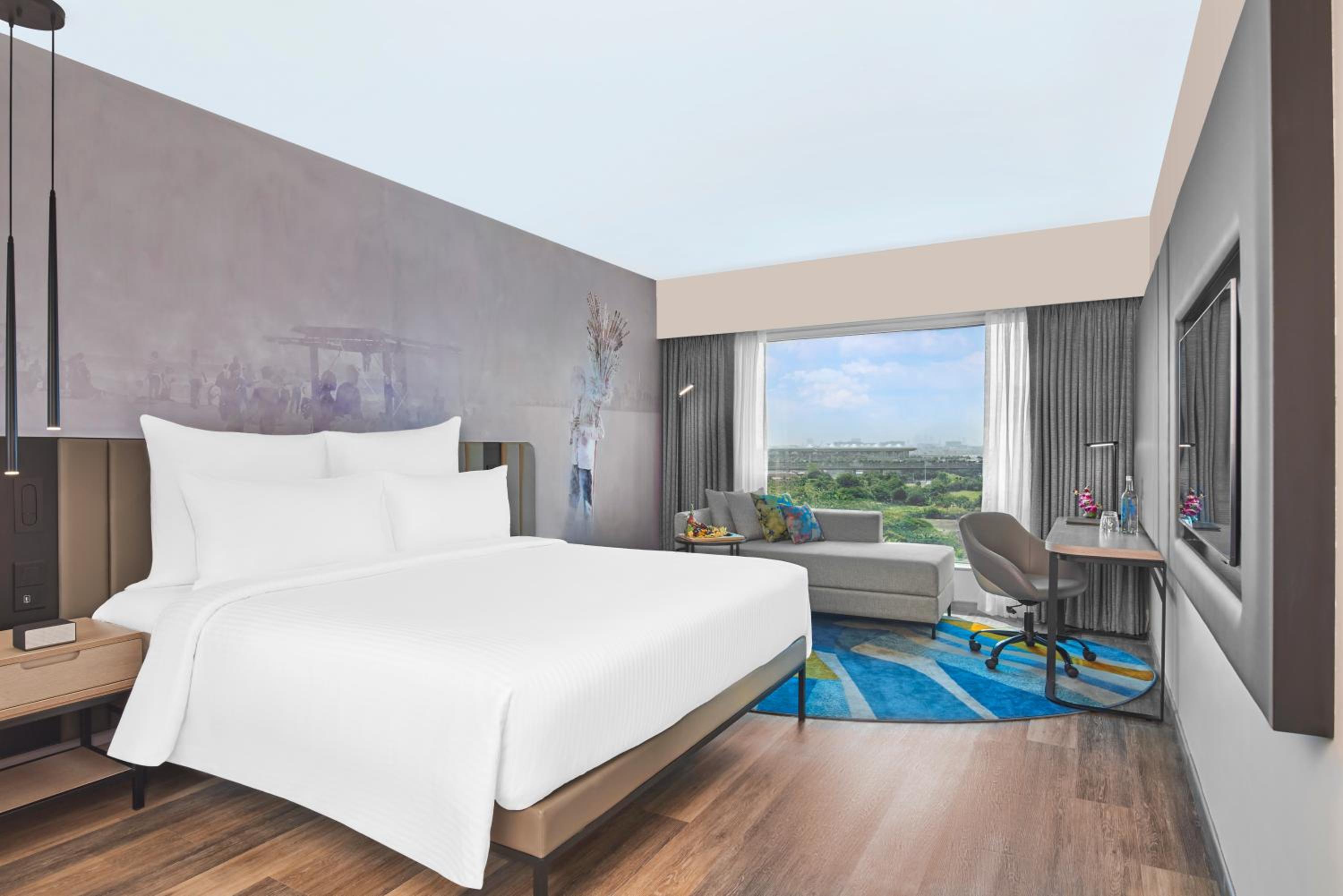 Deluxe King Room with 1+1 Happy Hours from 5pm to 7 pm on select beverages ,  20% Discount on Spa on select packages, Laundry, and Food & Soft Beverages