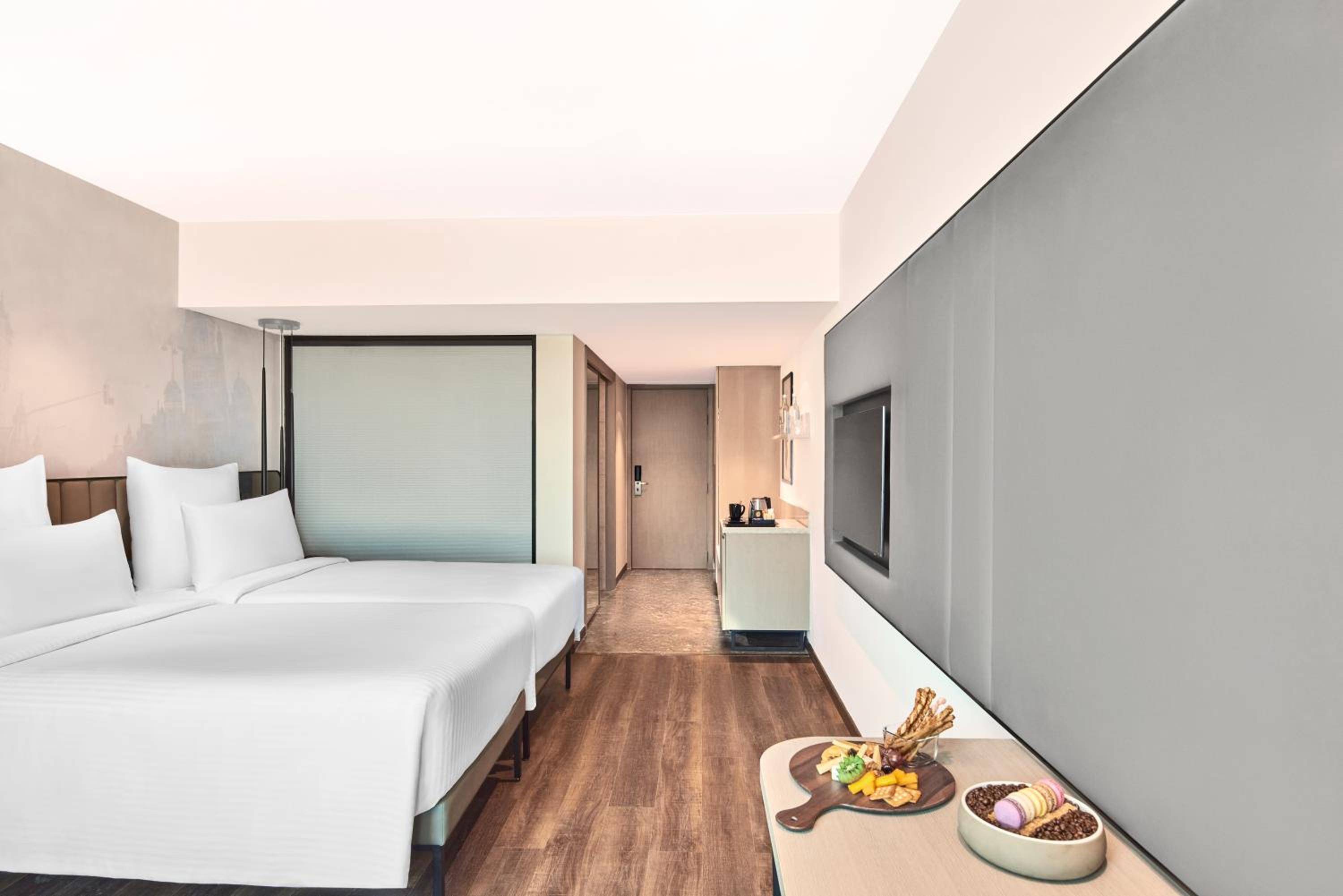 Superior Twin Room with 1+1 Happy Hours from 5pm to 7 pm on select beverages , 20% Discount on Spa on select packages, Laundry, and Food & Soft Beverages