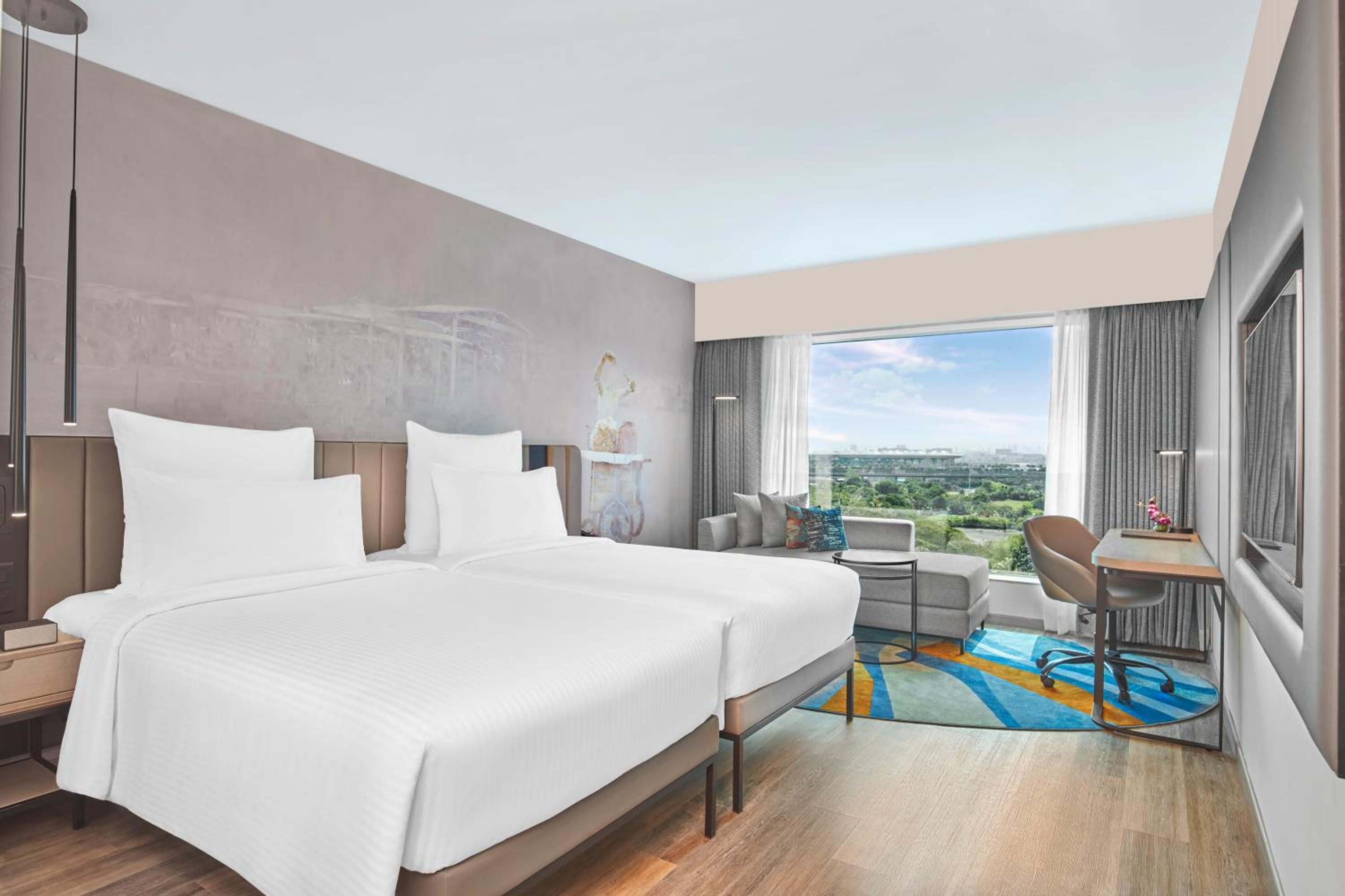 Deluxe Room Twin Beds with 1+1 Happy Hours from 5pm to 7 pm on select beverages , 20% Discount on Spa on select packages, Laundry, and Food & Soft Beverages