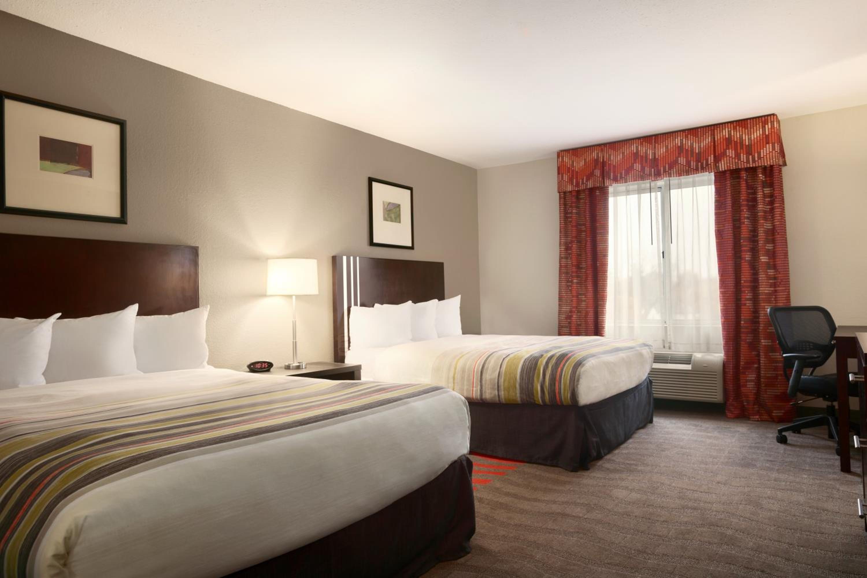 Queen Room with Two Queen Beds - Photo 1