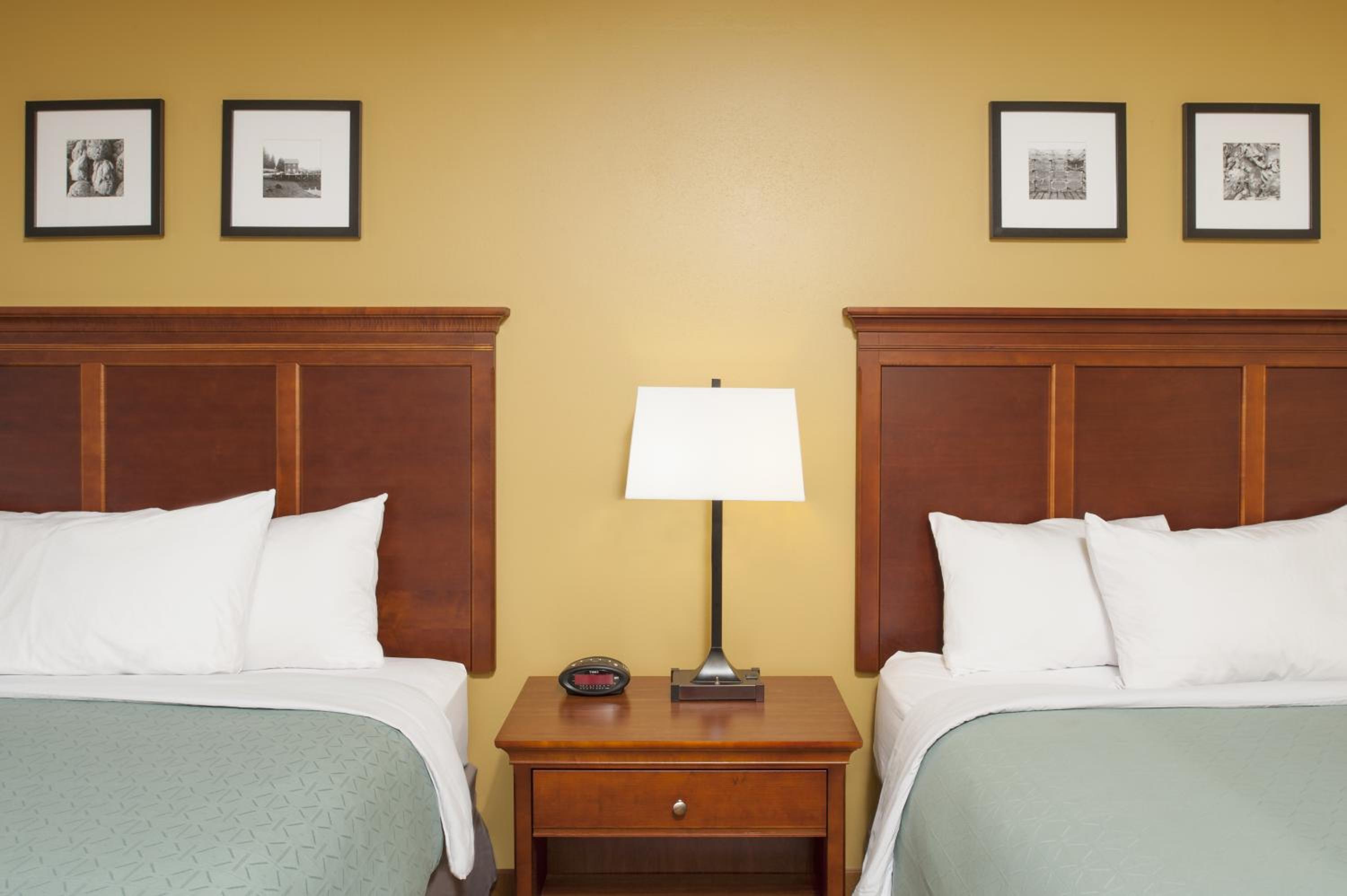 Queen Room with Two Queen Beds - Photo 1