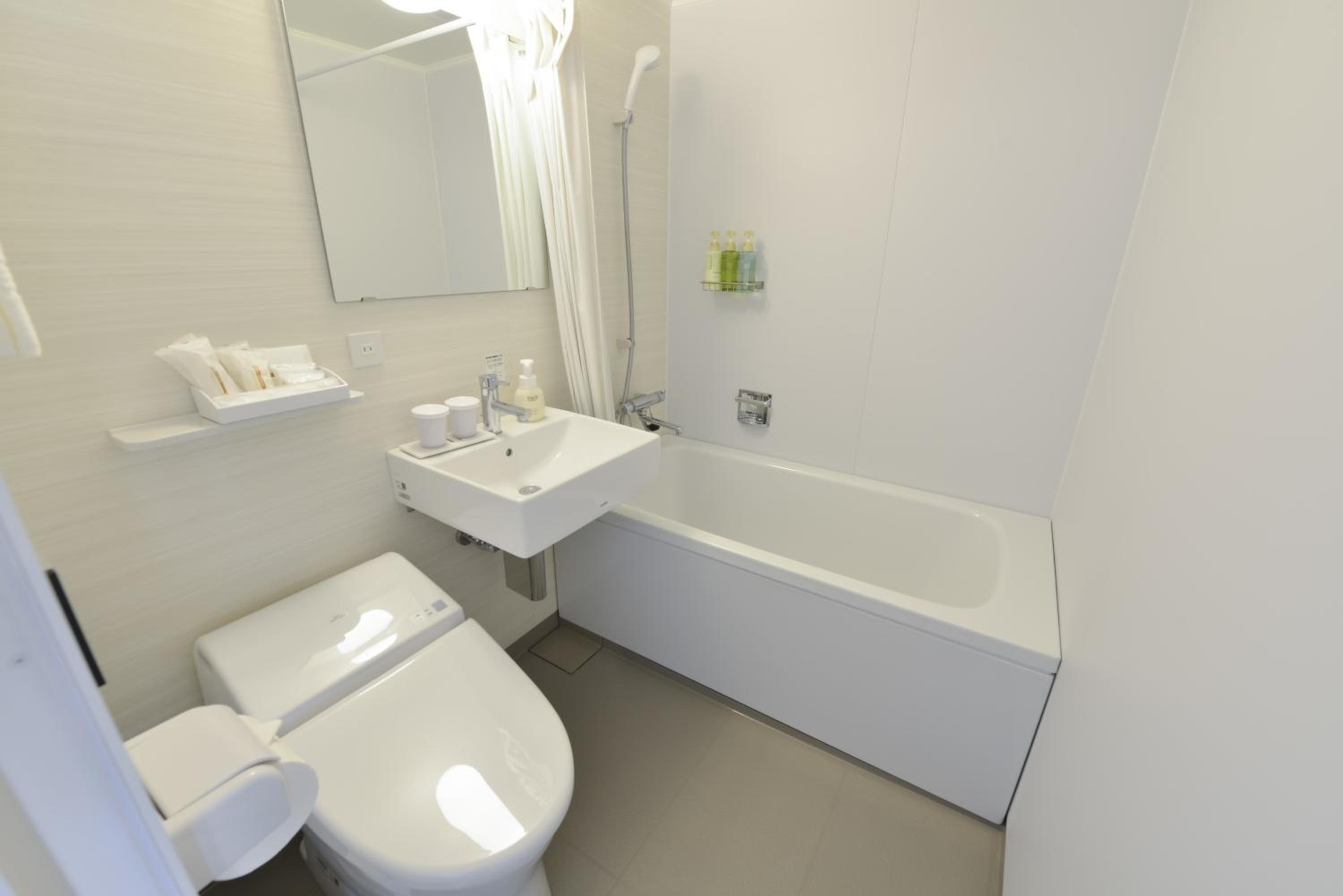 Standard Twin Room - Photo 16