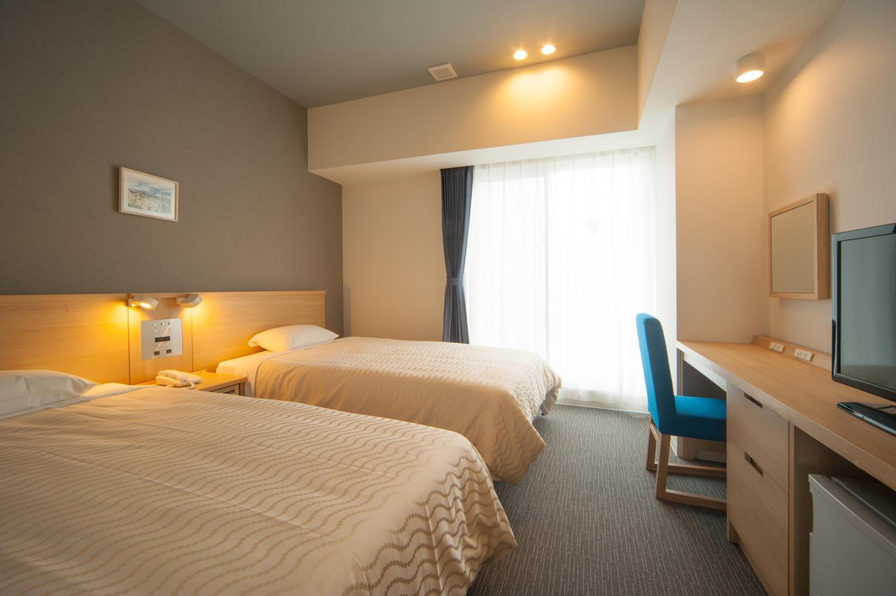 Economy Twin Room - Photo 8