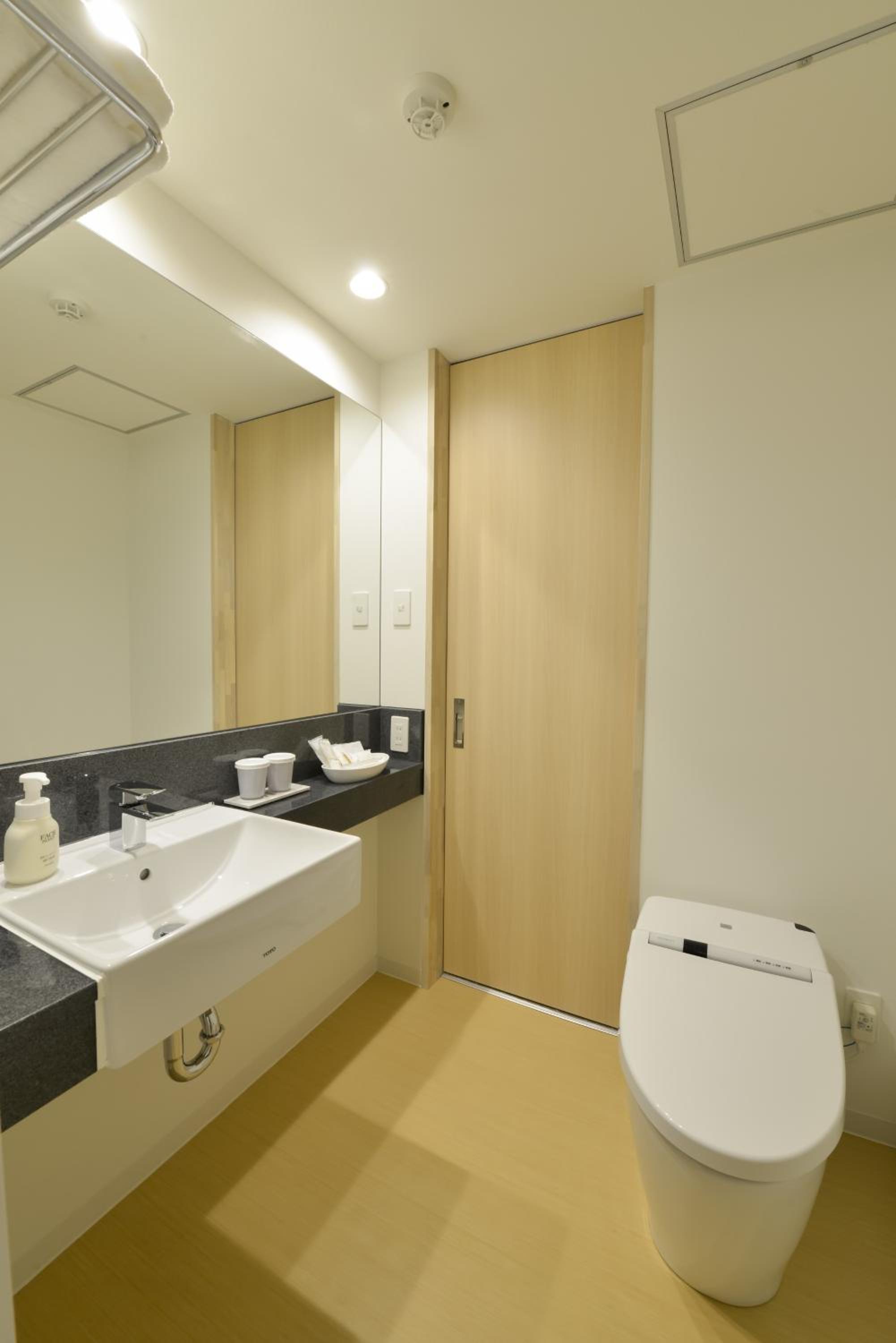 Deluxe Twin Room - Photo 16