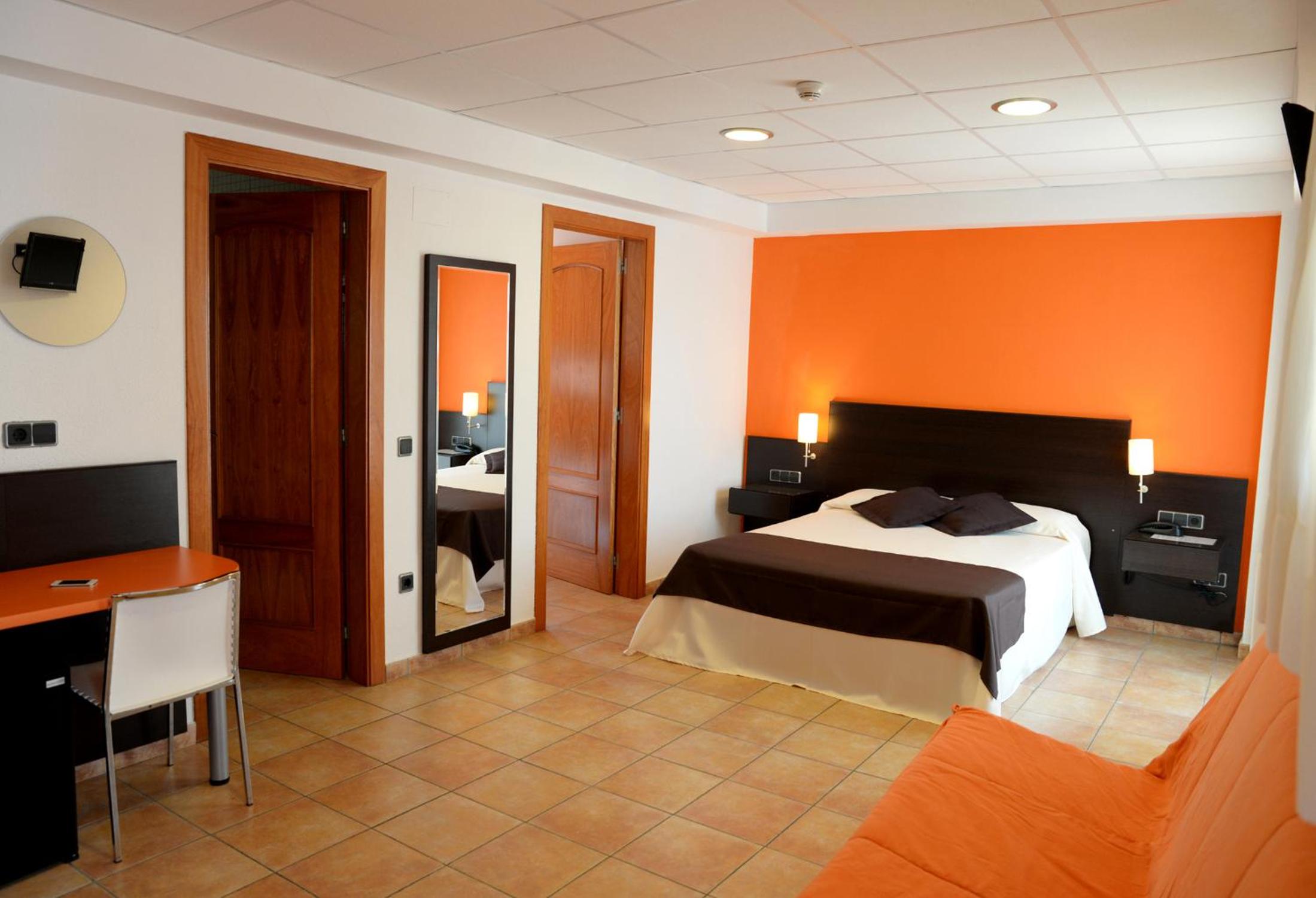 Habitación Cuádruple (2 Adultos + 2 Niños)