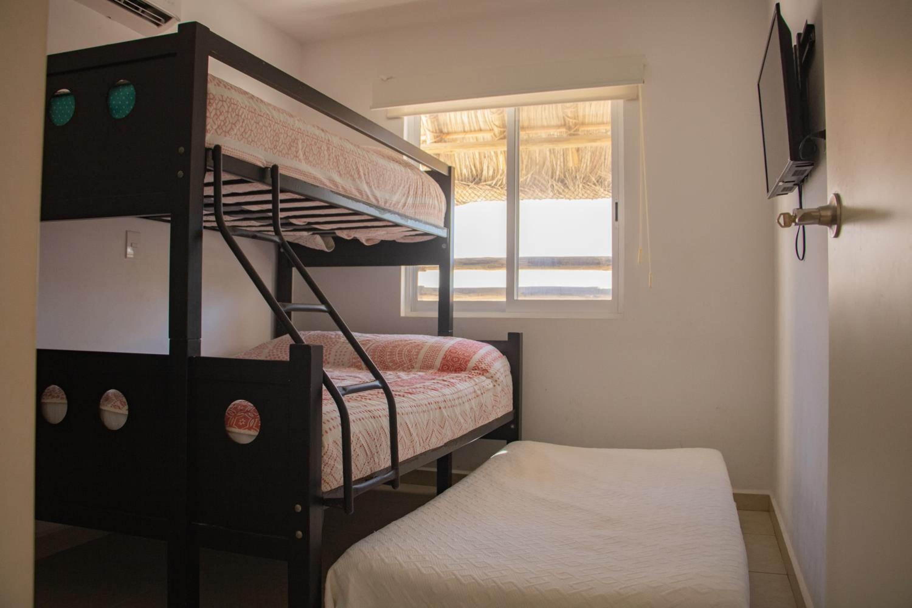 Three-Bedroom House - Photo 19
