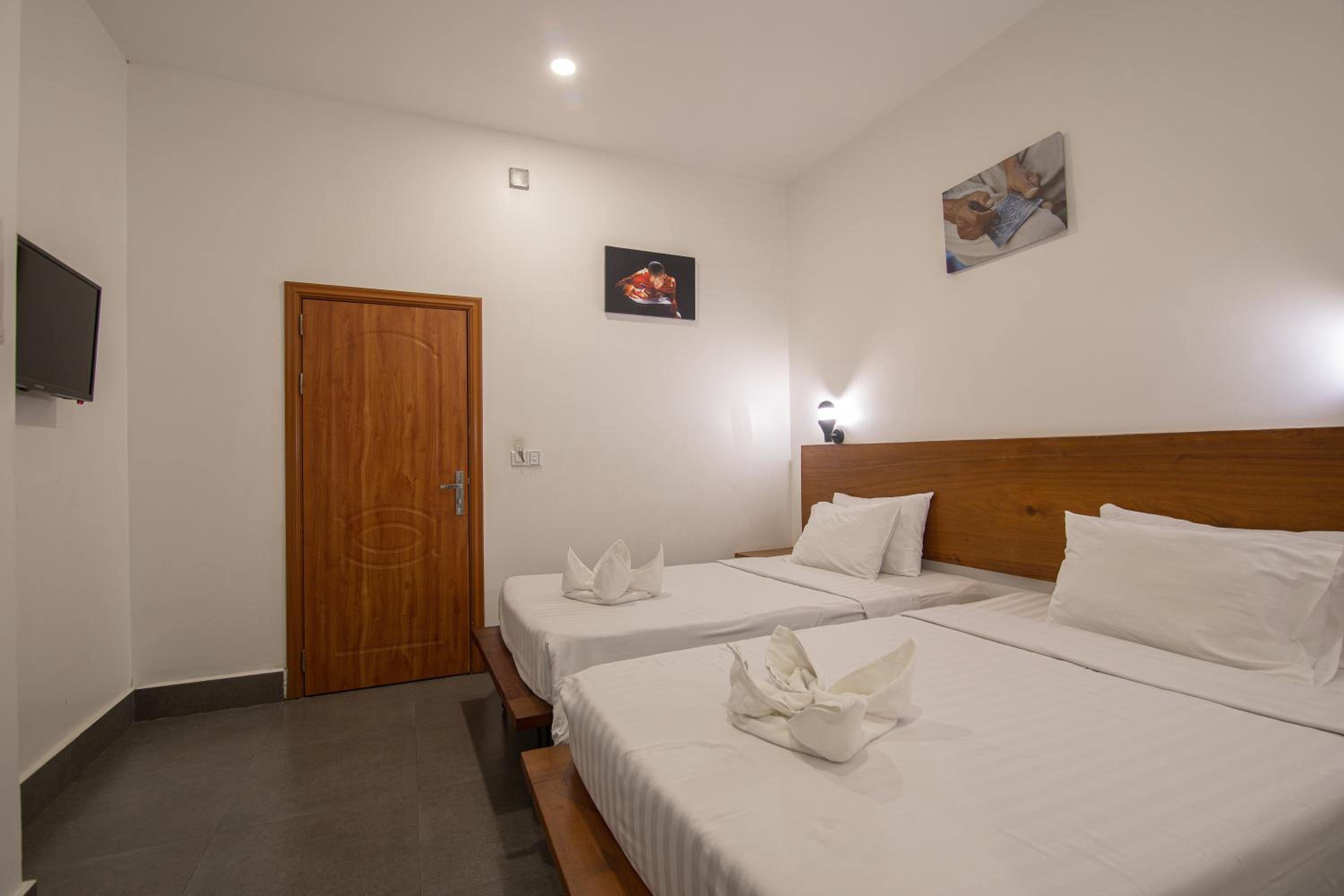Standard Twin Room - Photo 20