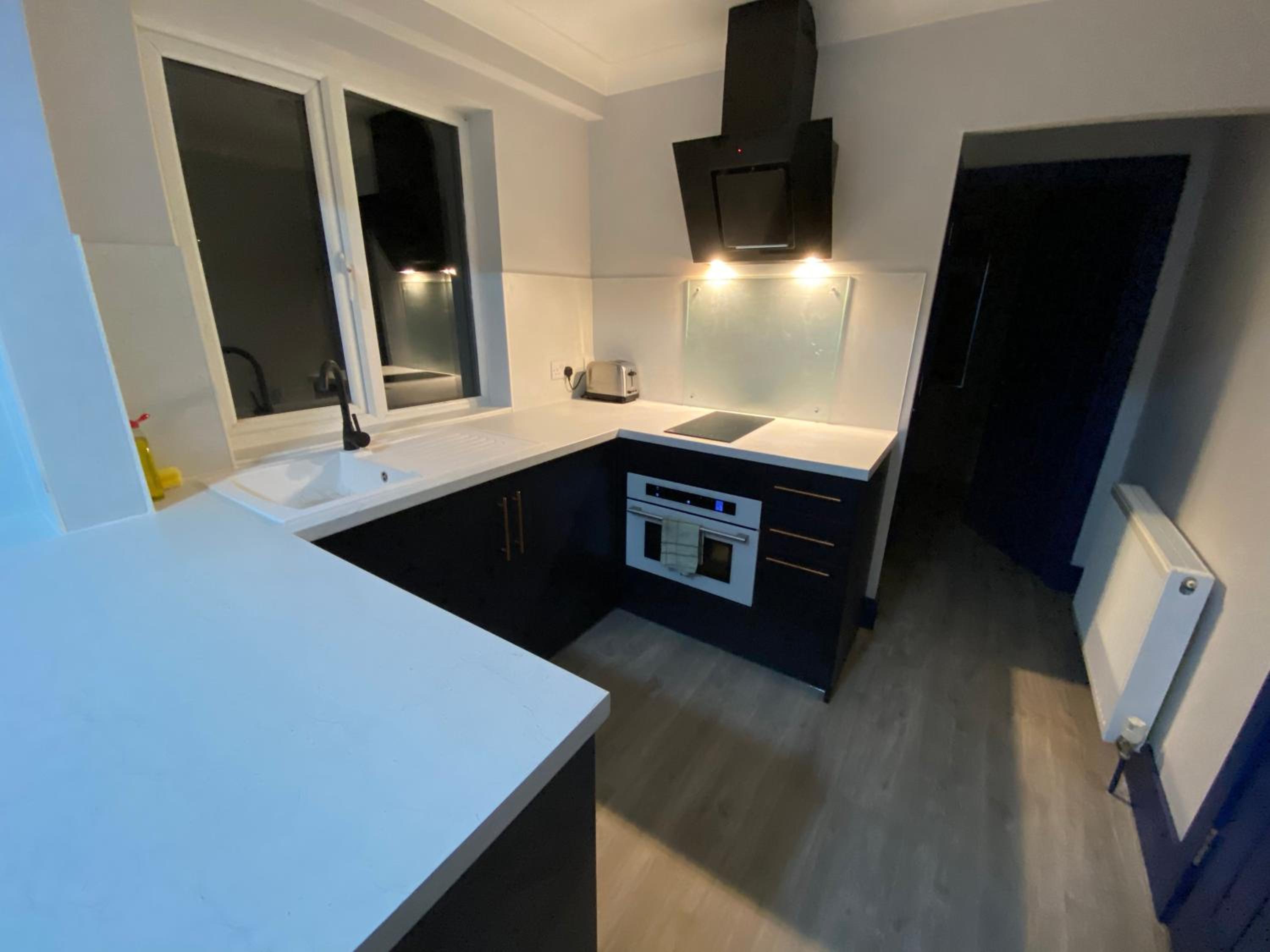 Three-Bedroom Apartment - Photo 5
