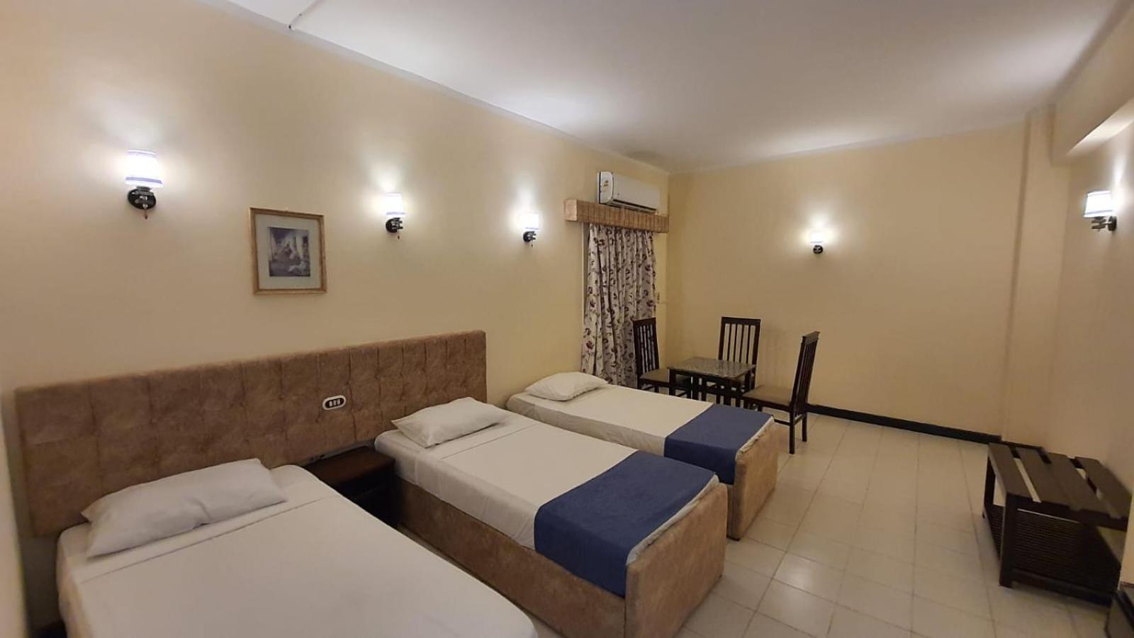Standard Triple Room - Photo 7