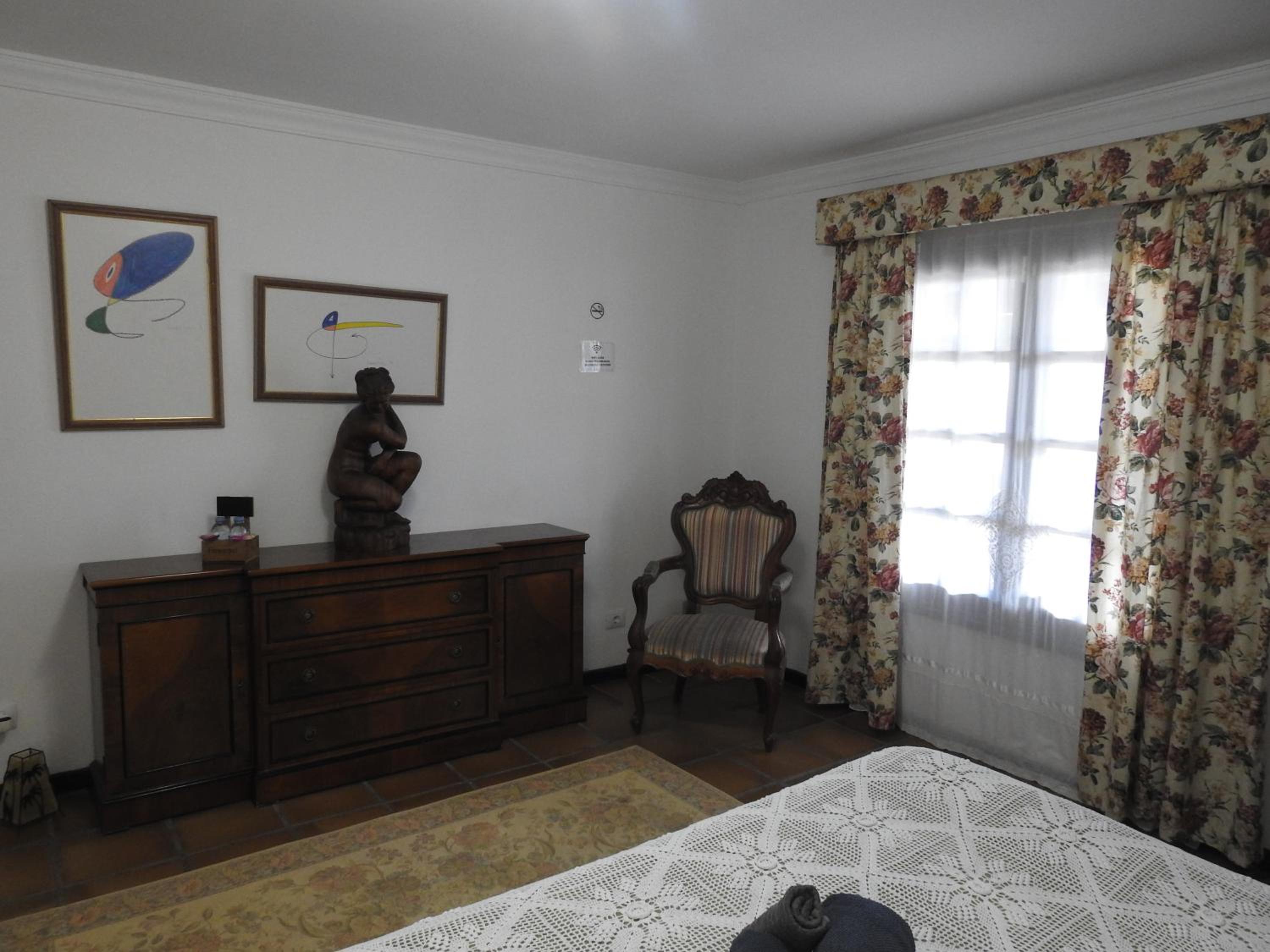 Habitación Deluxe King con baño compartido