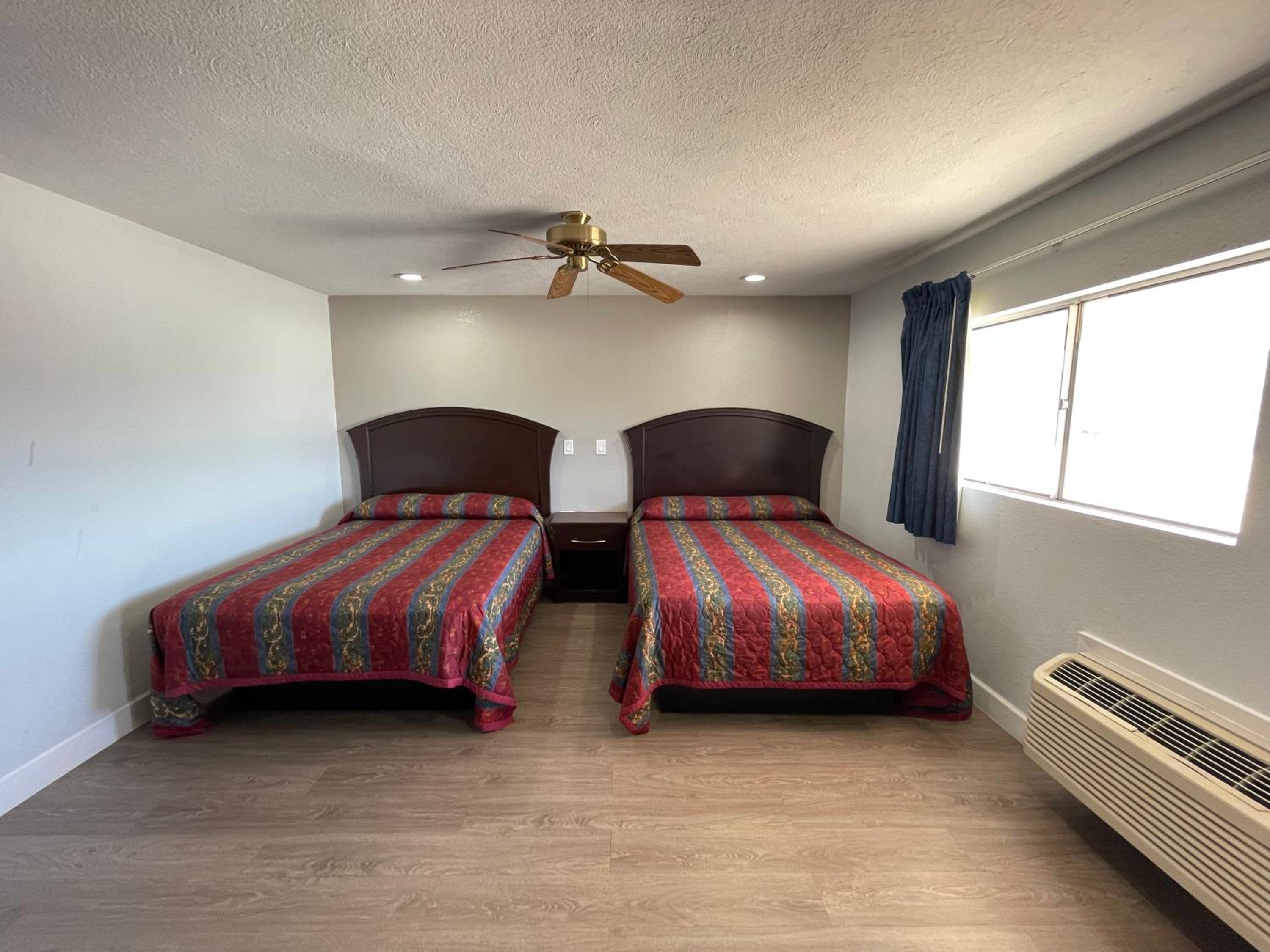 Queen Room with Two Queen Beds - Photo 1