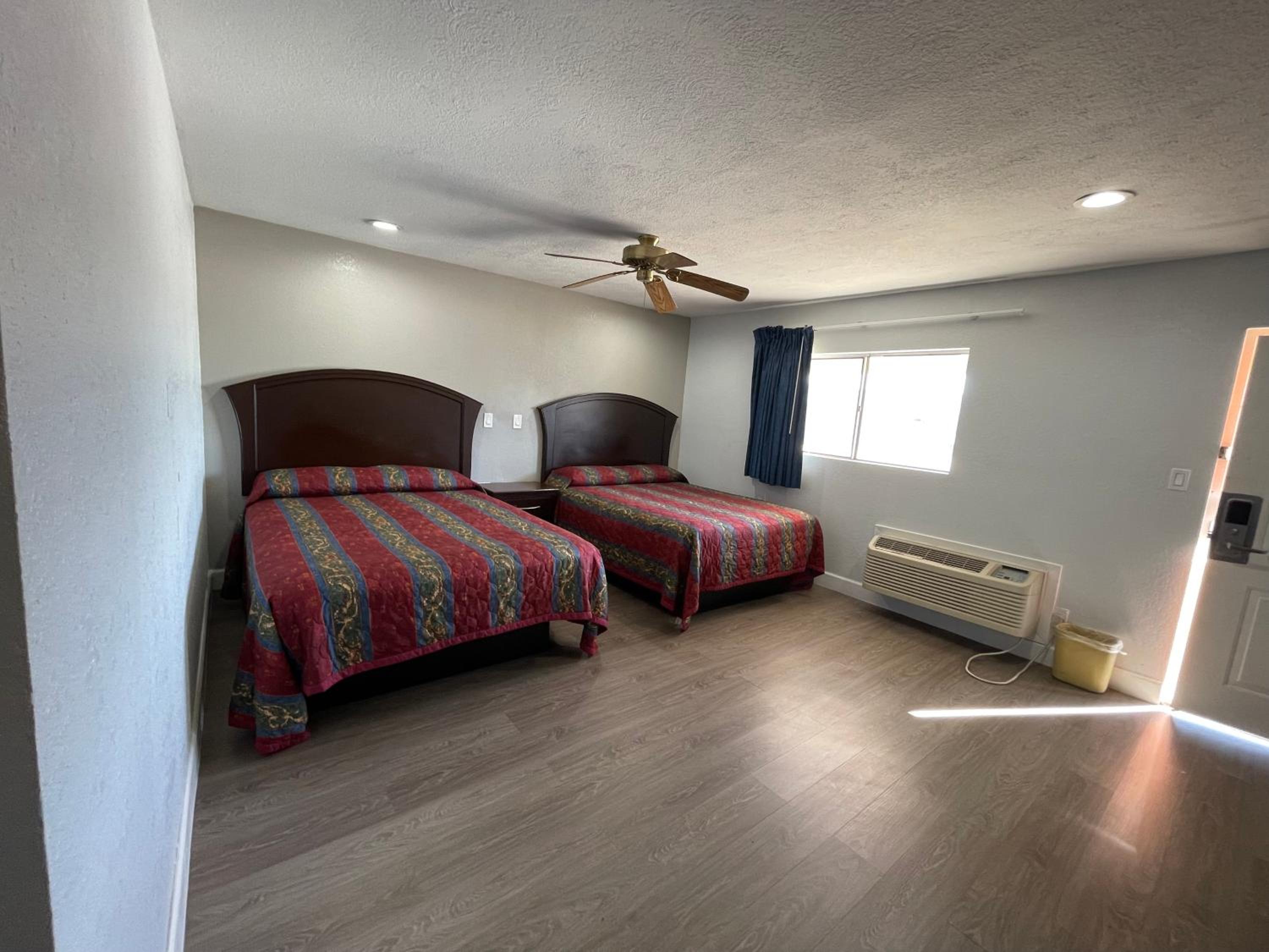 Queen Room with Two Queen Beds - Photo 10