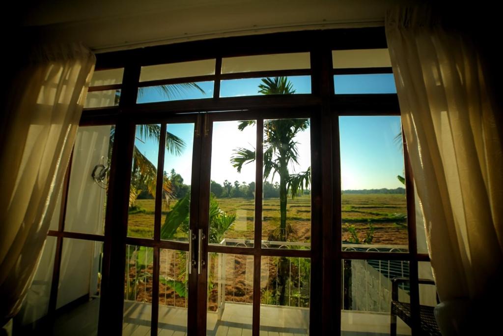 Deluxe Double Room with Balcony & Rice Paddy View photo 1
