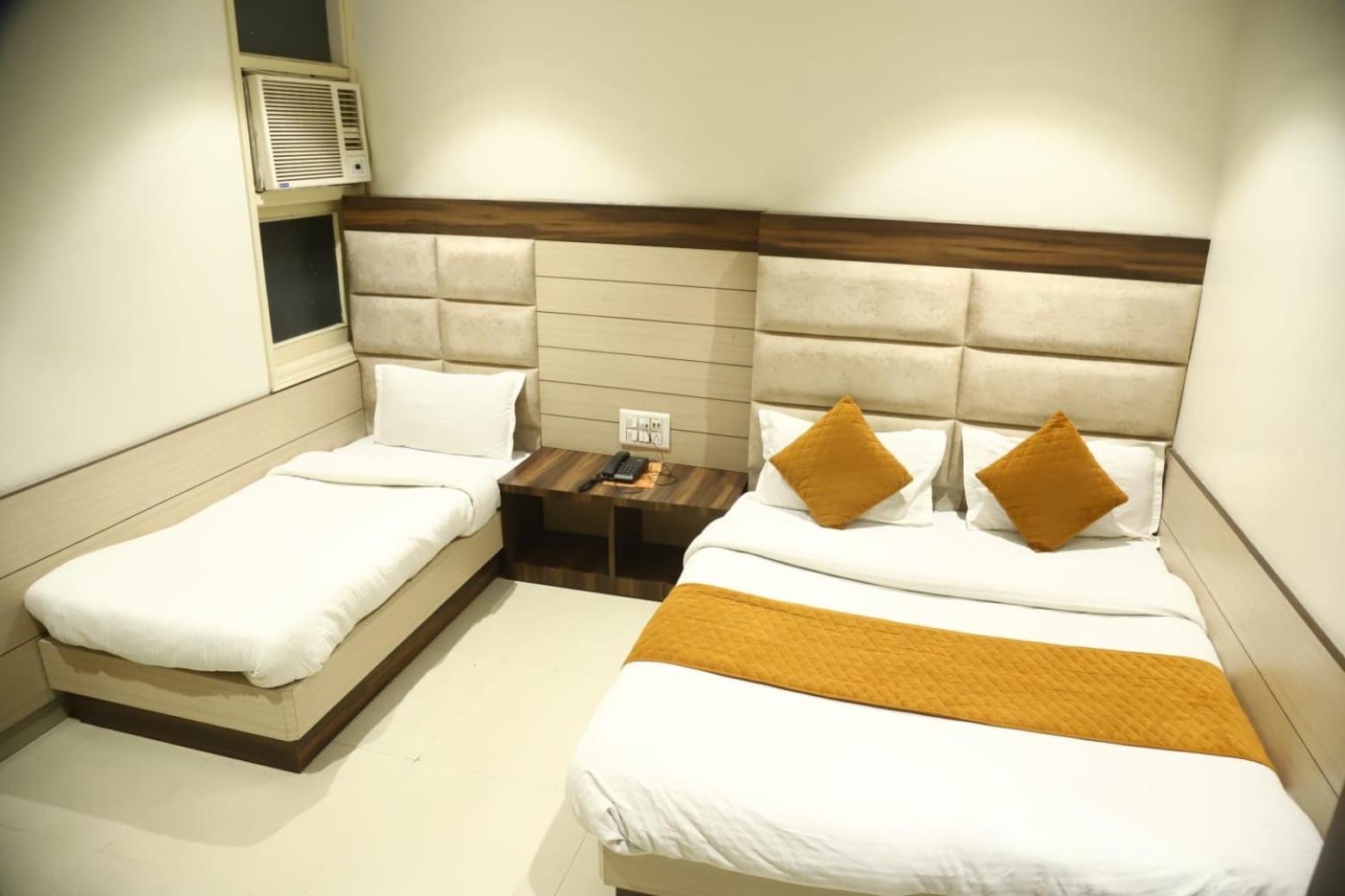 Deluxe Triple Room - Photo 1
