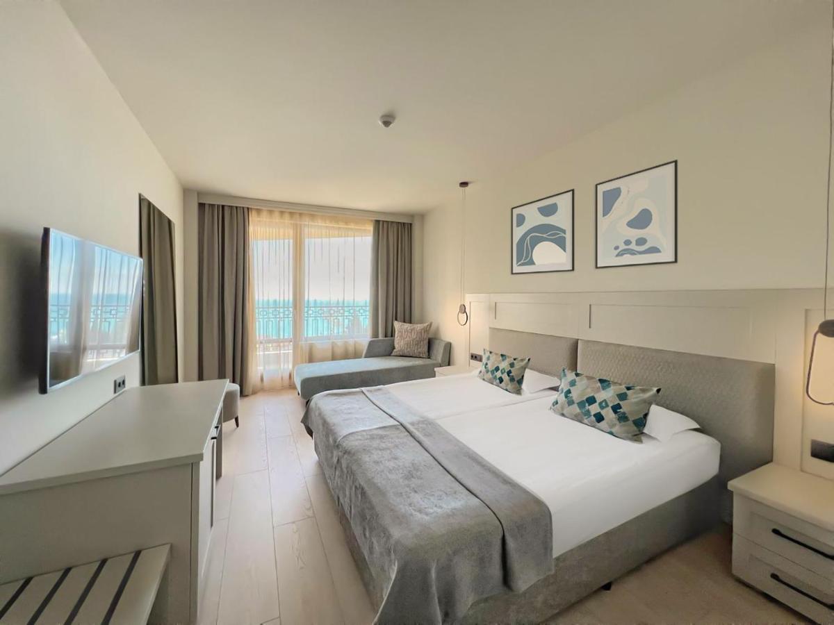 Double Room with Side Sea View – Free Private Beach Access photo 1