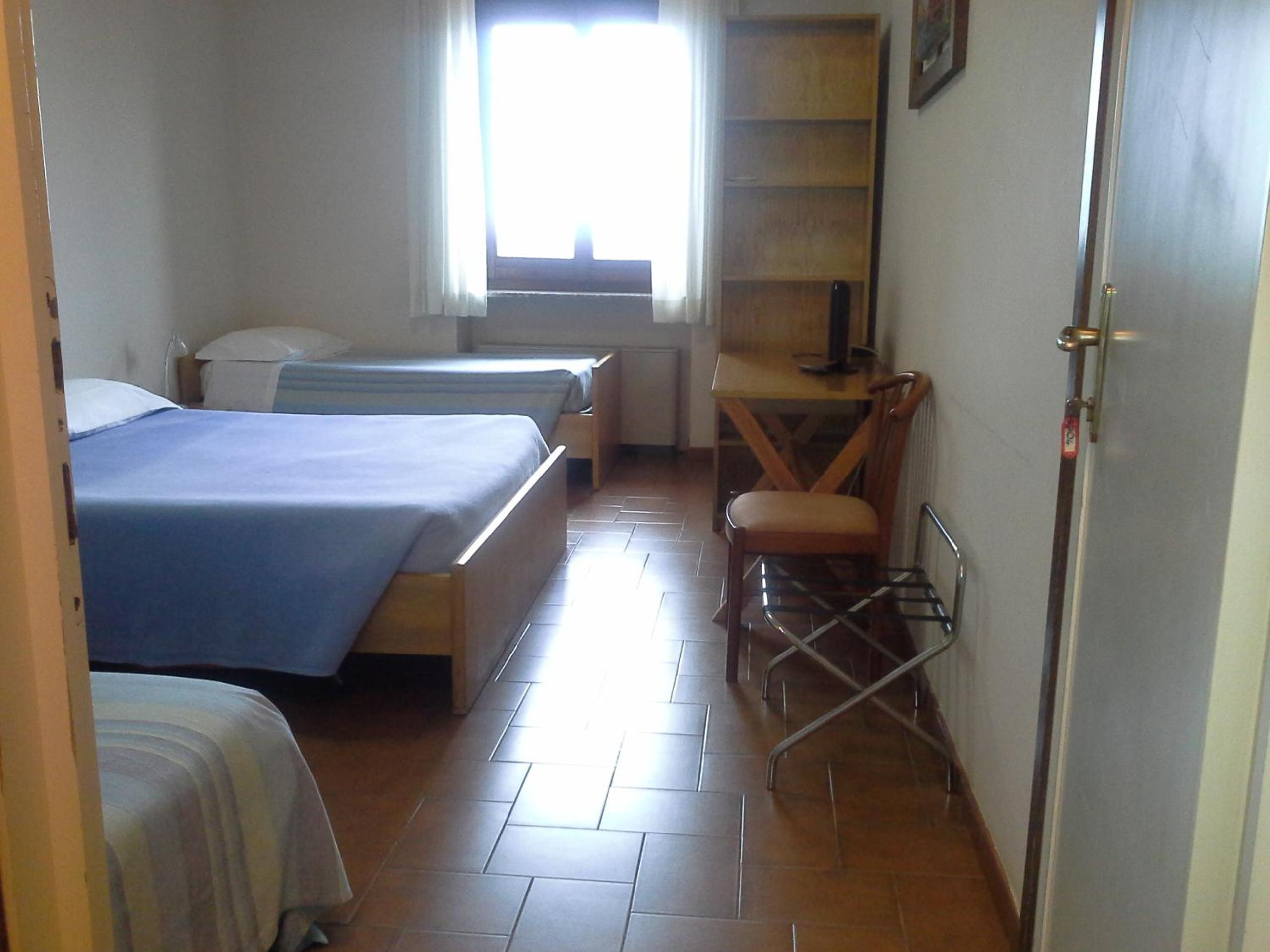 Quadruple Room with Private Bathroom - Photo 1