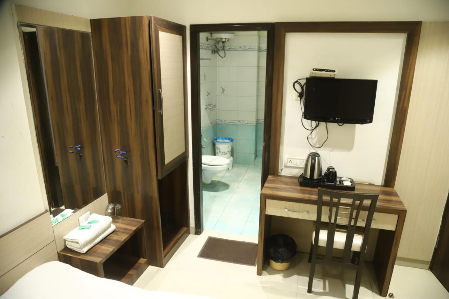 Deluxe Triple Room - Photo 11