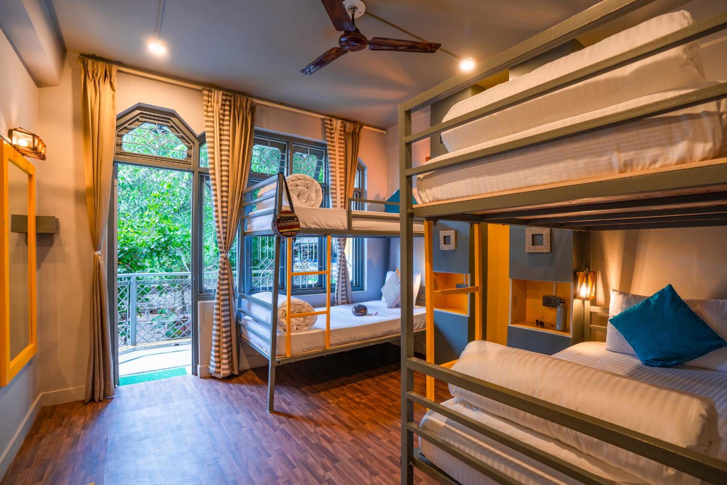 Bed in 4-Bed Mixed Dormitory Room with Balcony photo 1
