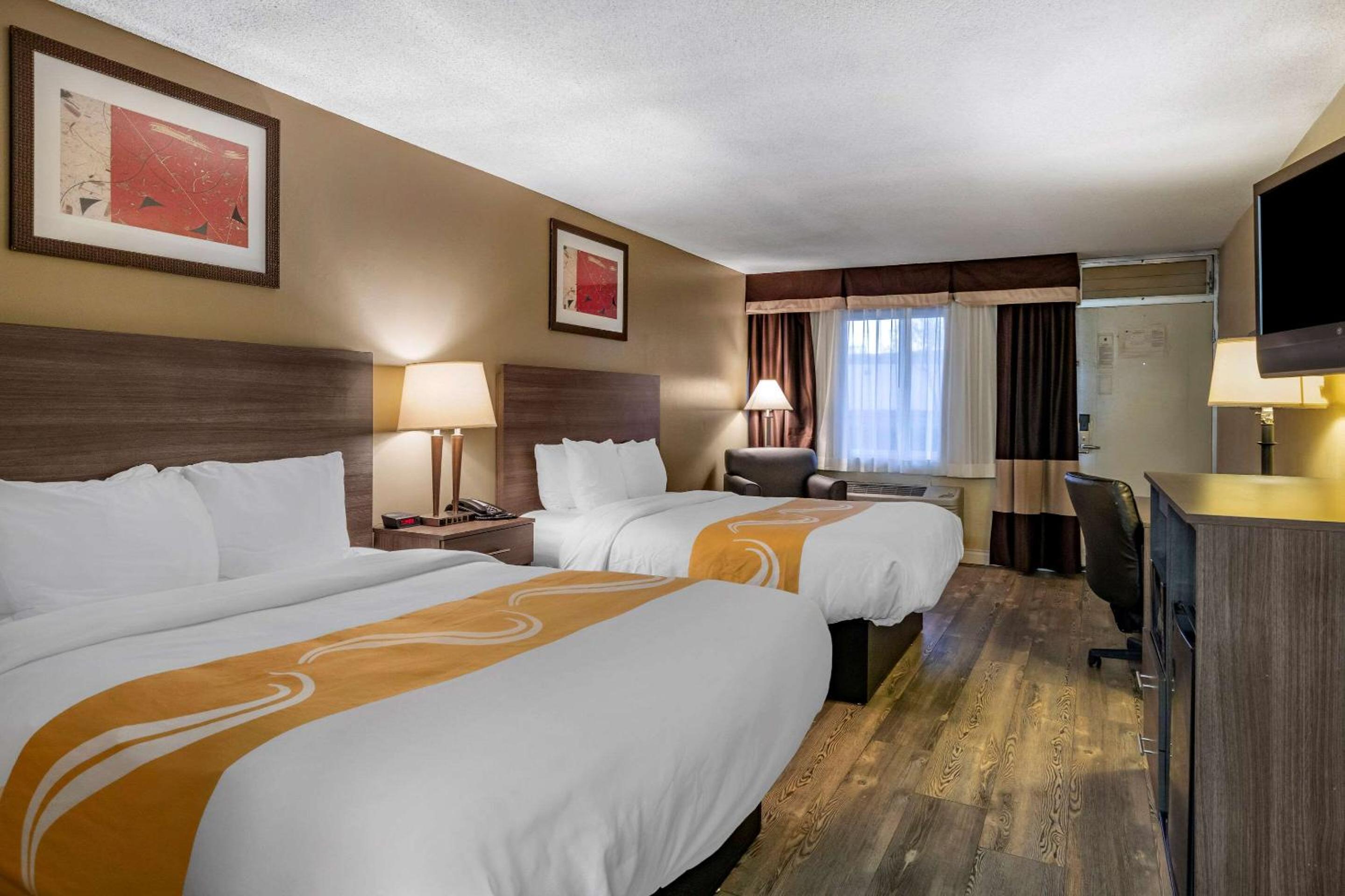 Deluxe Queen Room with Two Queen Beds - Non-Smoking - Photo 1