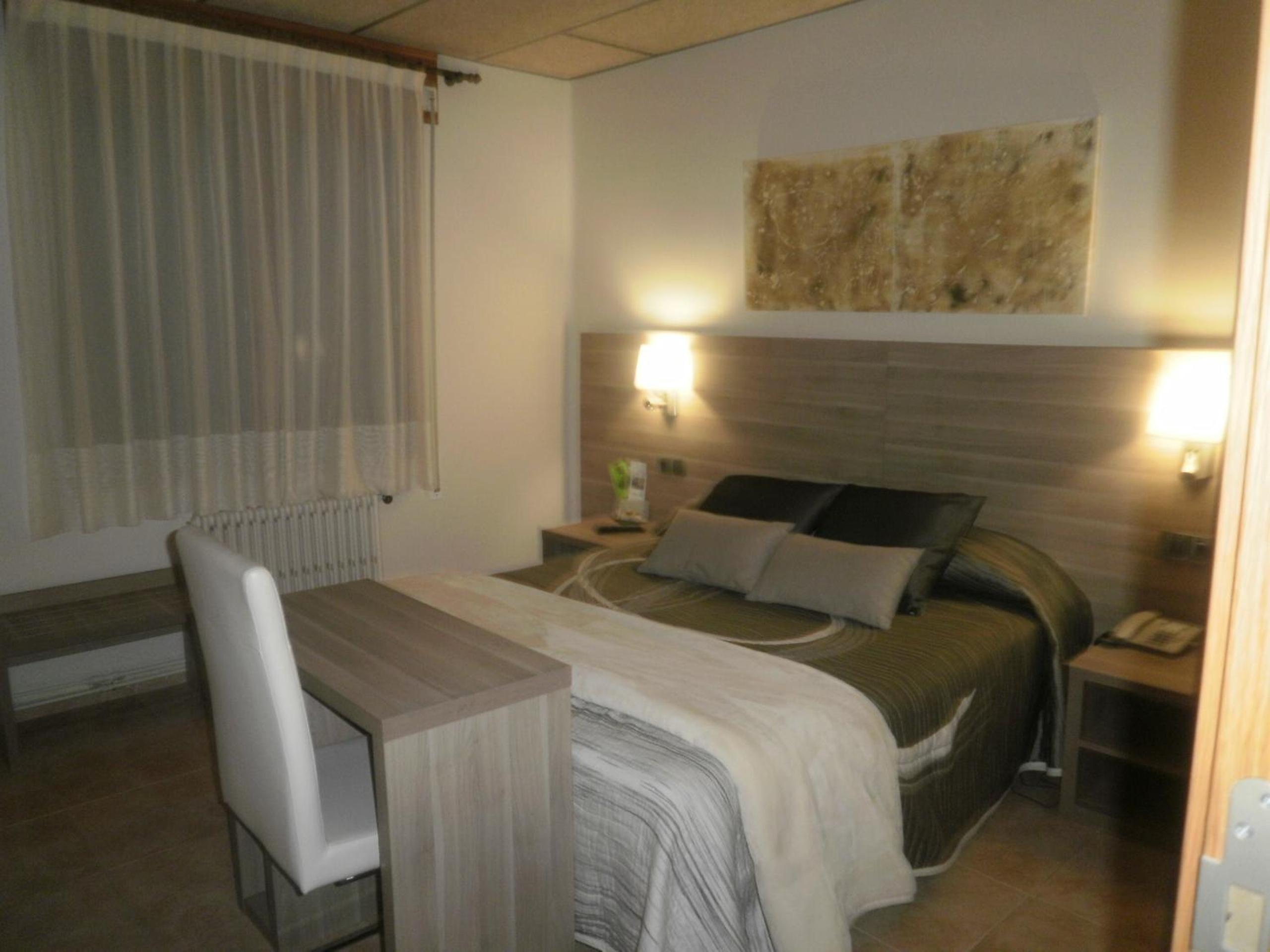Habitación Doble Estándar o con Dos Camas Individuales.