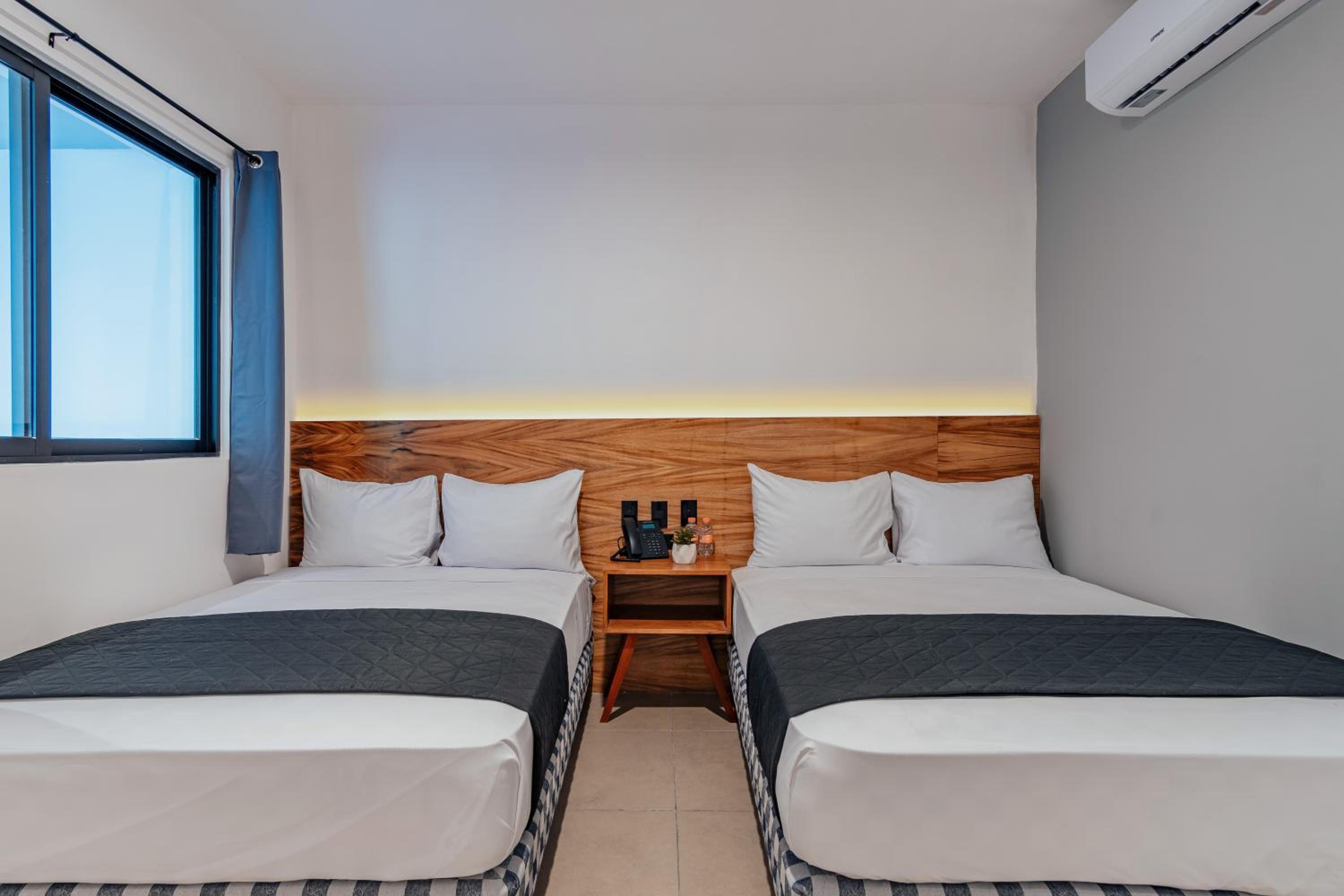 Chambre Deluxe avec 2 Lits Doubles