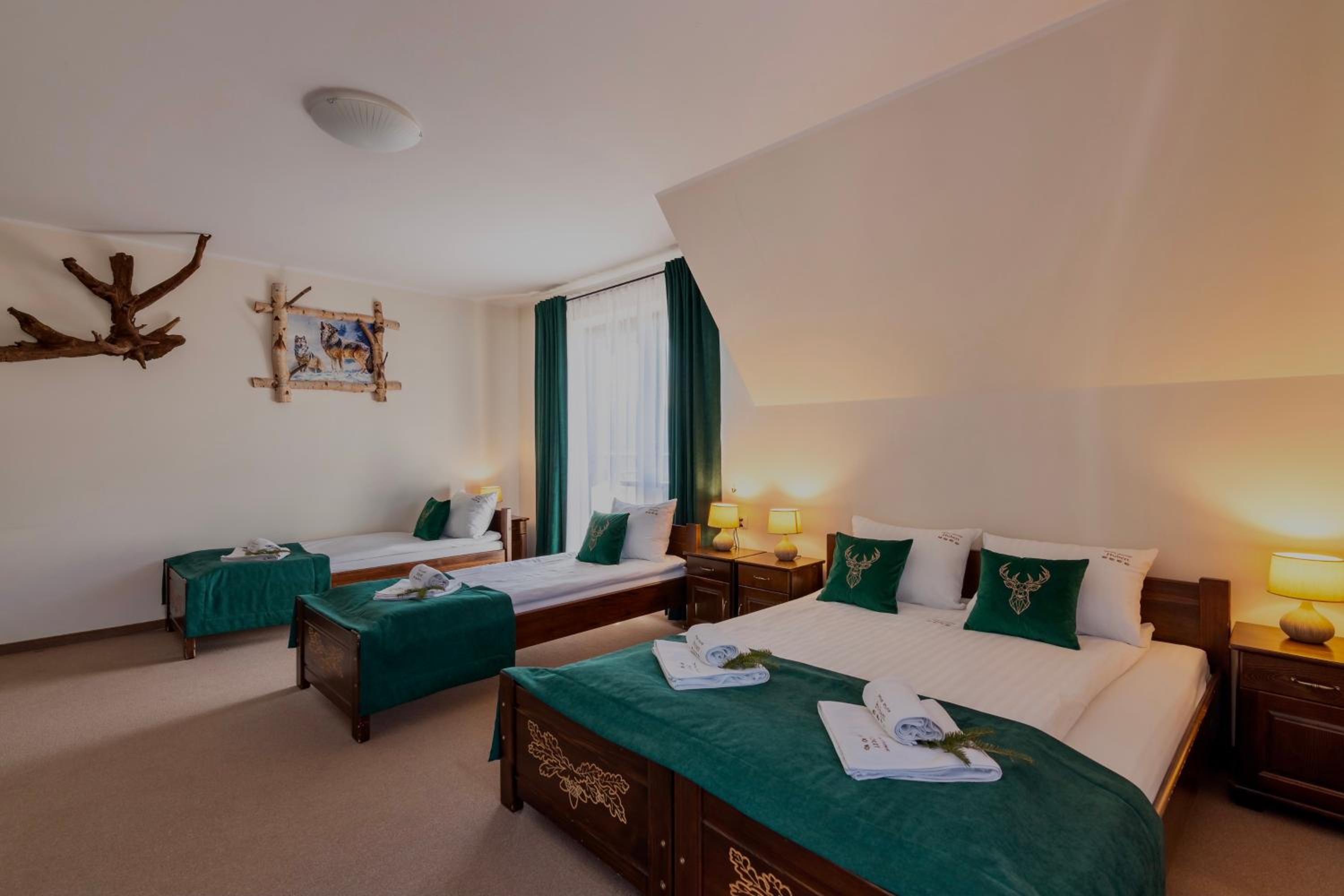 Quadruple room without a balcony with a kitchenette
