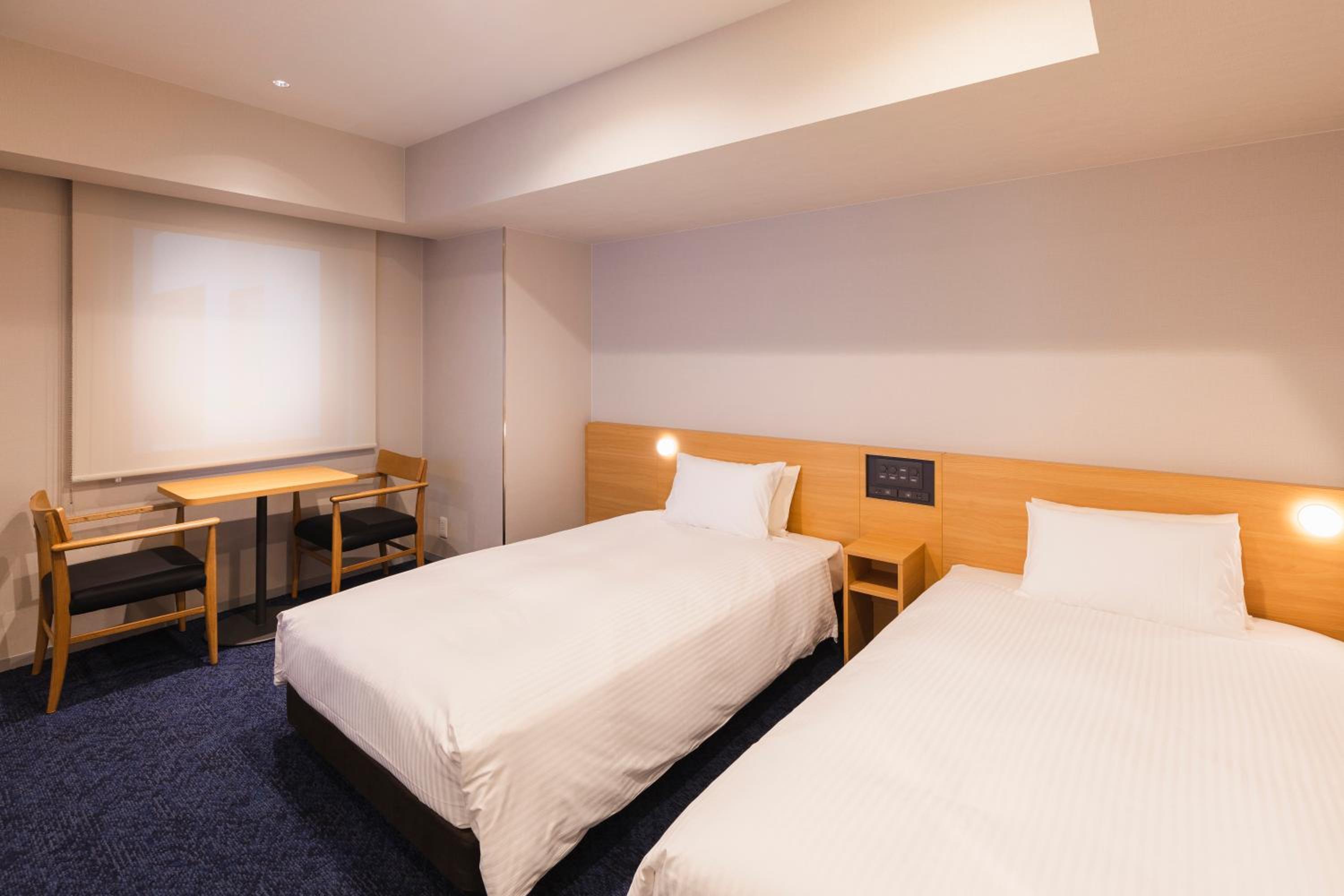 Universal Twin Room - Non-Smoking - Photo 1