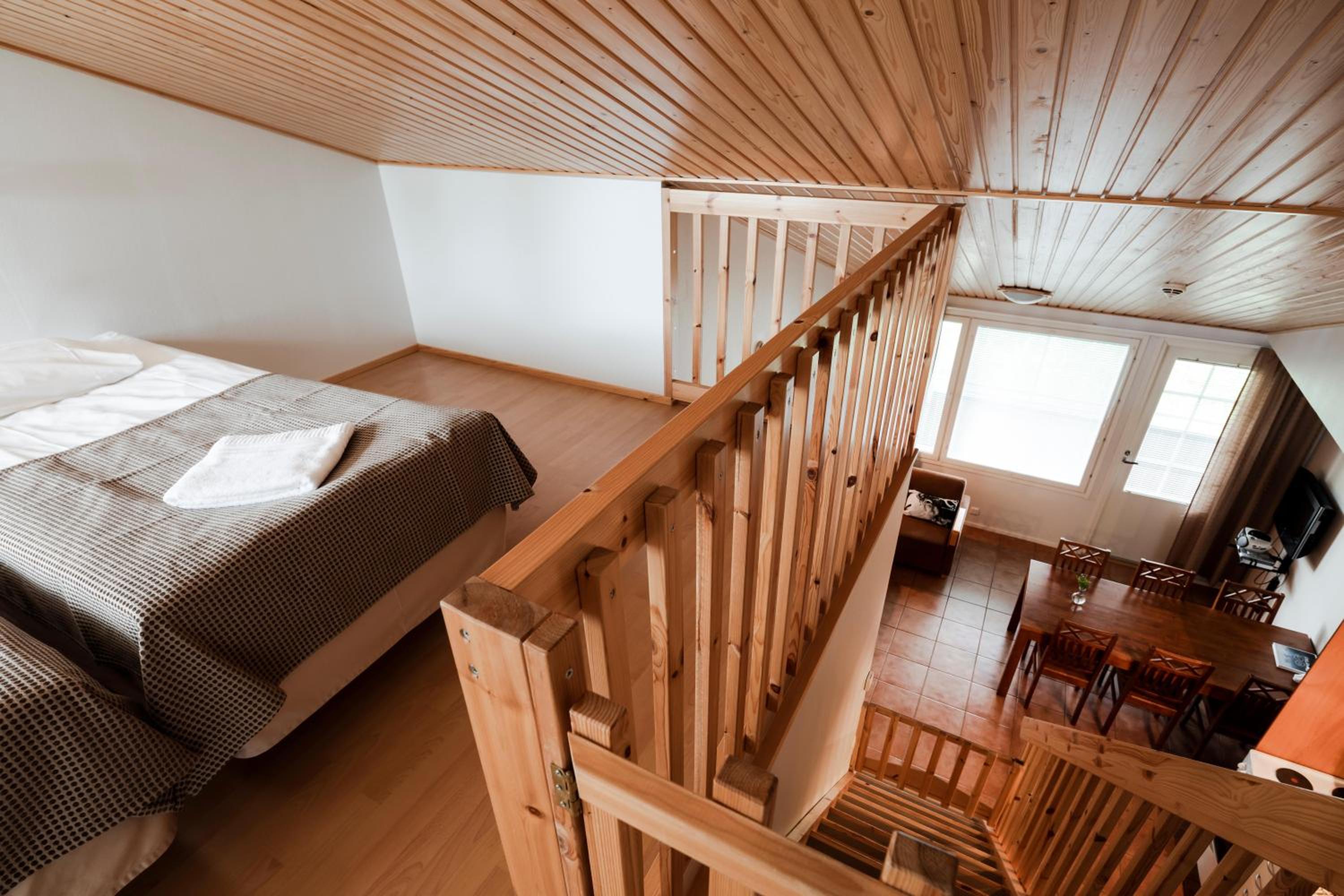 One-Bedroom Holiday Home with Sleeping Loft and Sauna - Photo 1